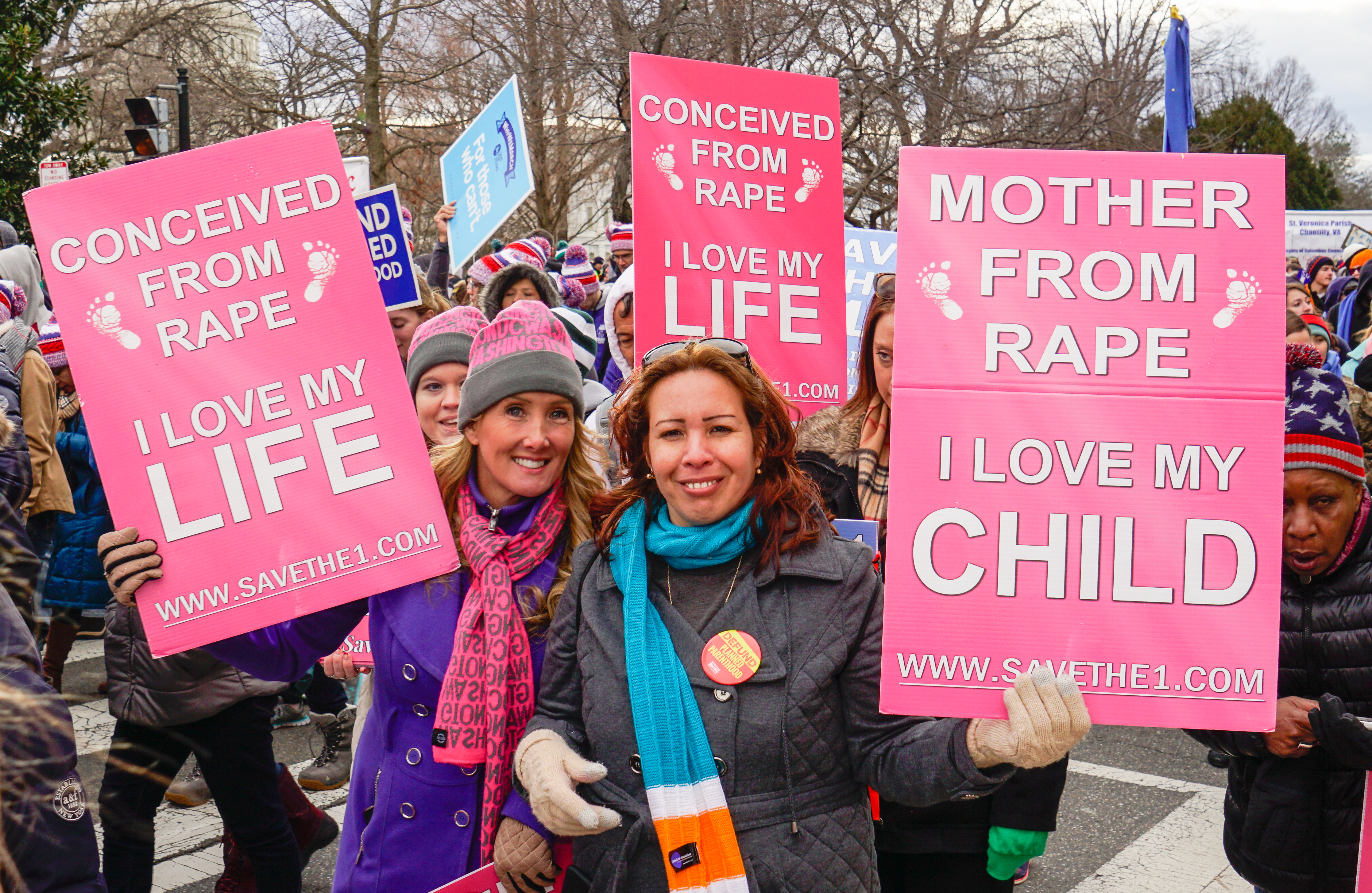 Washington, DC - January 27, 2017- Women holding signs advocate against abortion, even in the case of rape, during the annual March for Life. Xavier Ascanio, Shutterstock.