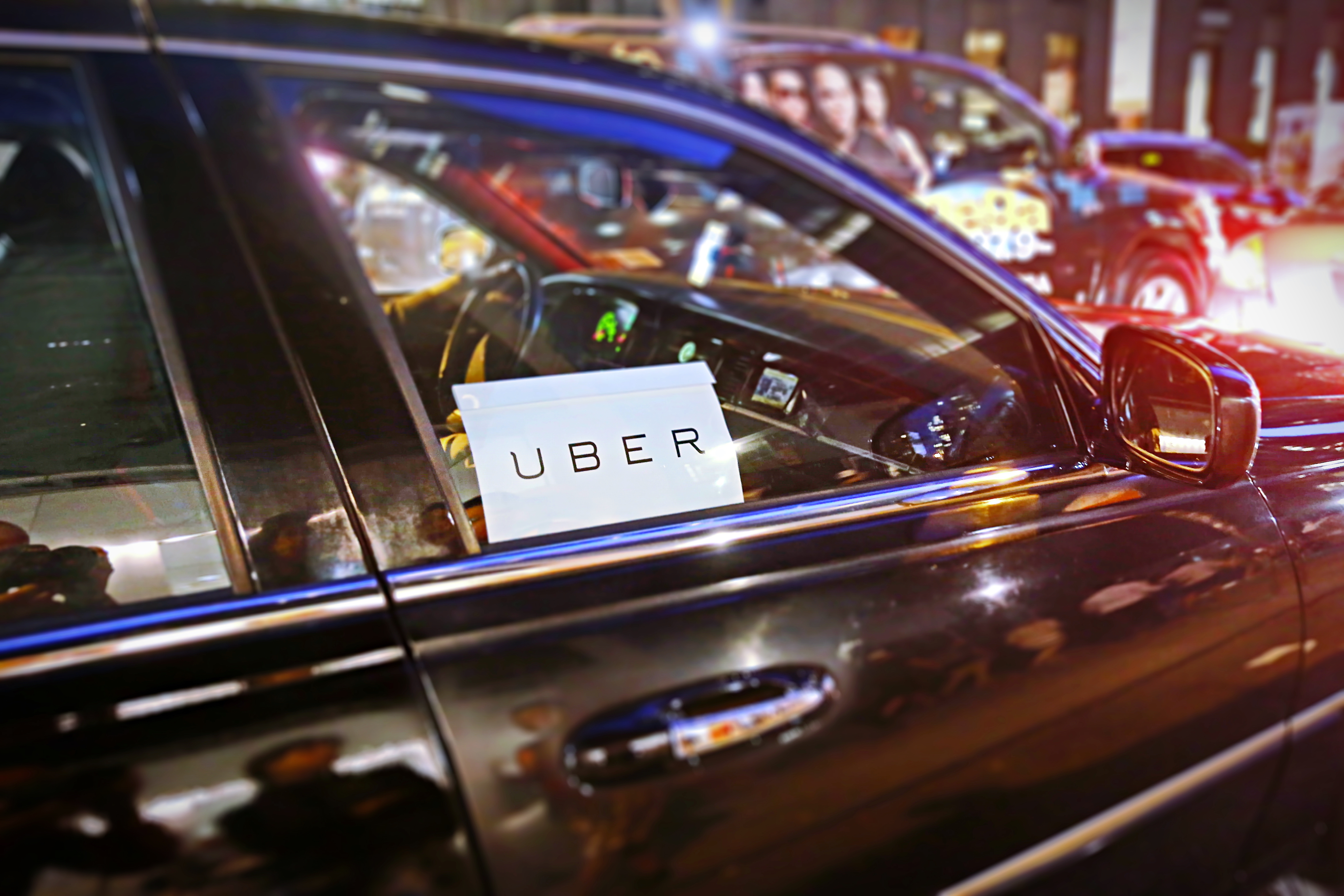 An Uber waits in New York City. Shutterstock image via MikeDotta