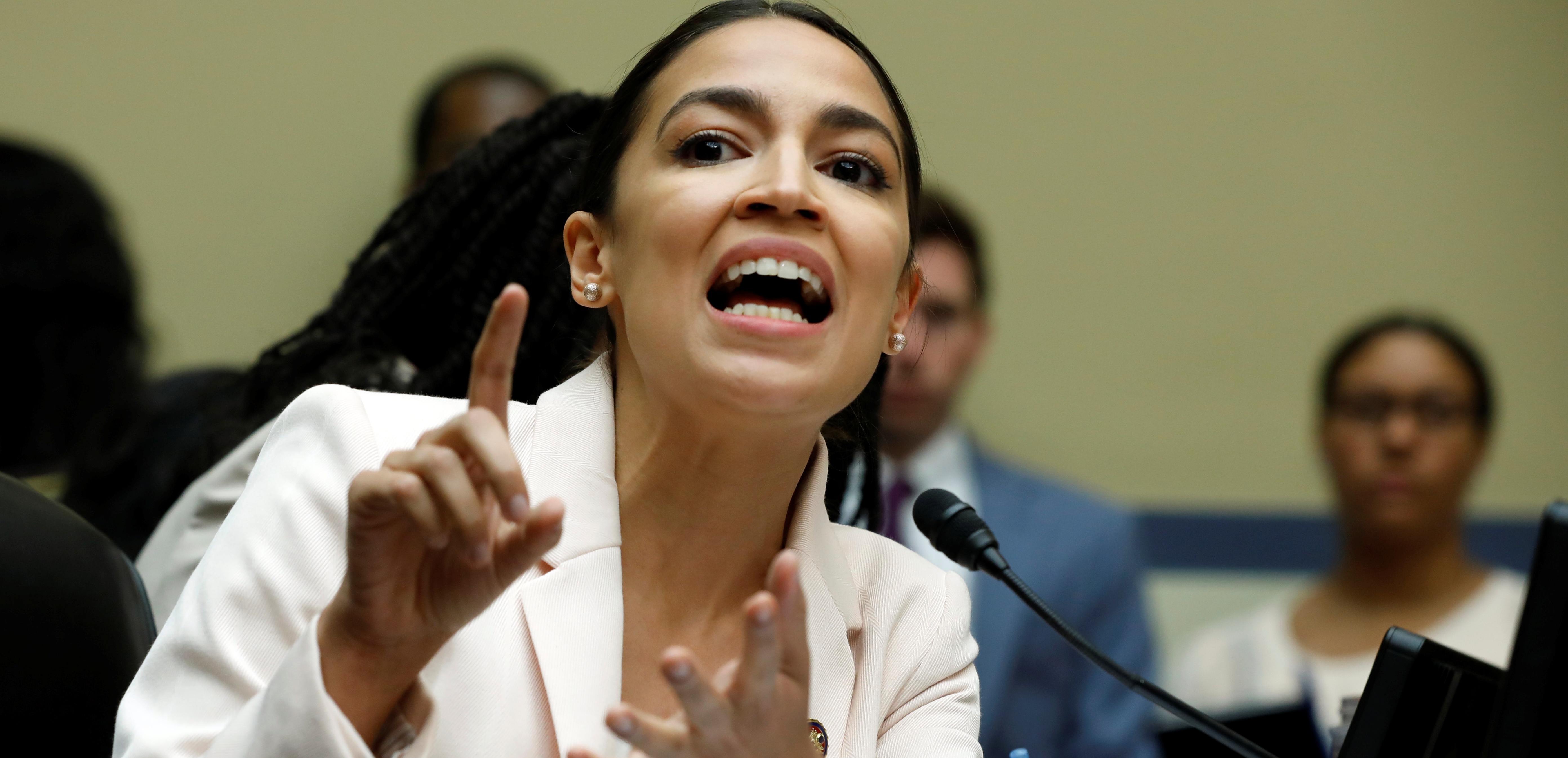 Rep. Alexandria Ocasio-Cortez (D-NY) speaks during House Oversight and Reform Committee hearing on contempt votes on whether to find Attorney General William Barr and Commerce Secretary Wilbur Ross in contempt of Congress for withholding Census documents on Capitol Hill in Washington, U.S., June 12, 2019. REUTERS/Yuri Gripas