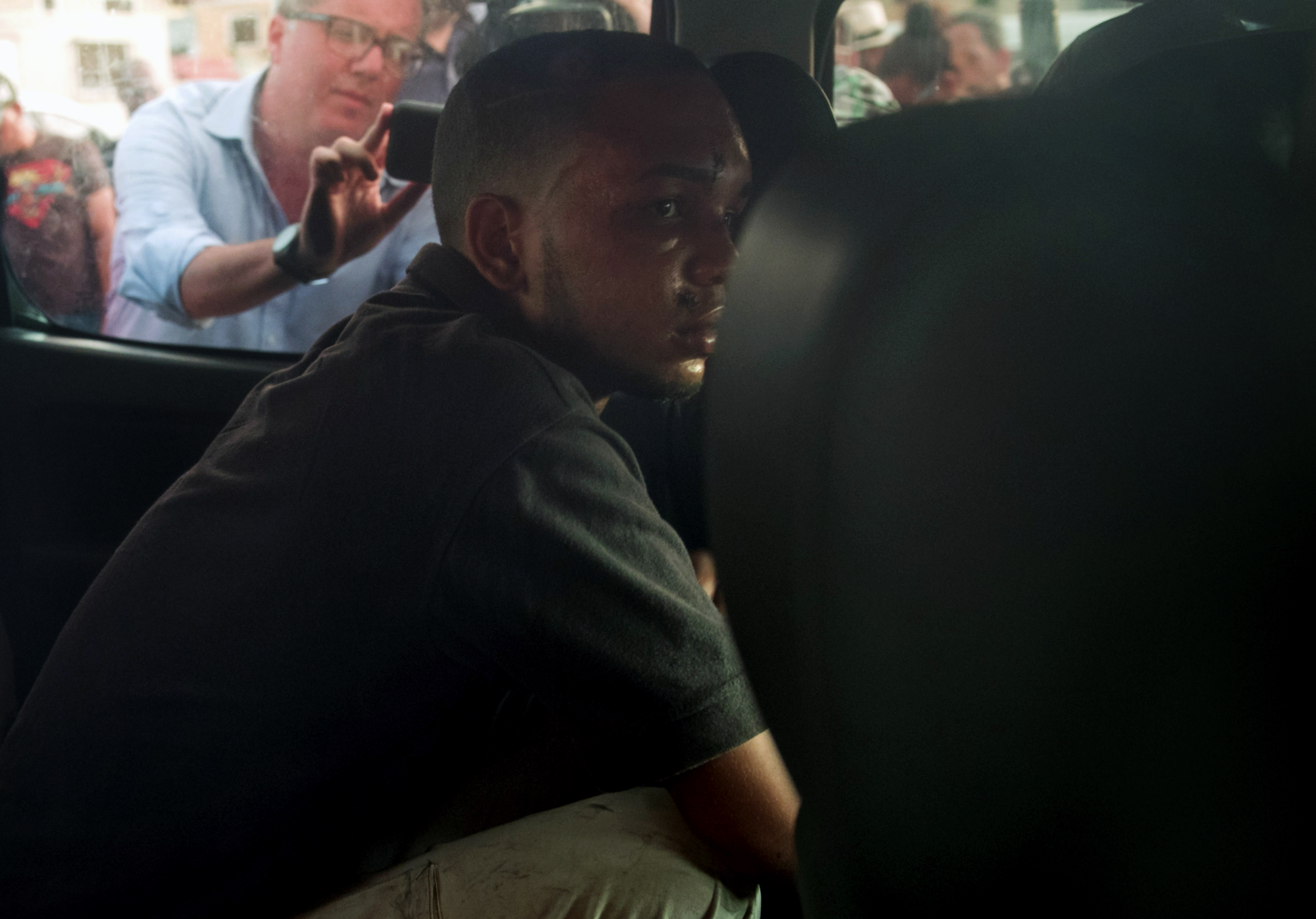 Eddy Vladimir Feliz Garcia, in custody in connection with the shooting of former Boston Red Sox slugger David Ortiz, is transferred by police to court in Santo Domingo, Dominican Republic, on June 11, 2019. (Photo credit ERIKA SANTELICES/AFP/Getty Images)