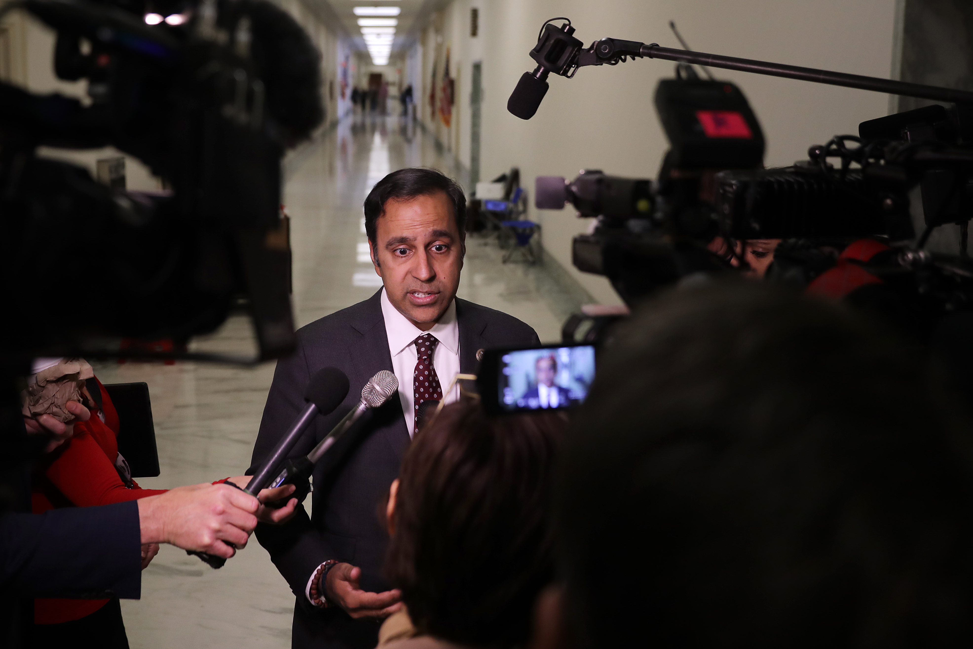 House Oversight and Government Reform Committee member Rep. Raja Krishnamoorthi talks to journalists during a break in a closed-door hearing in the Rayburn House Office Building on Capitol Hill October 19, 2018 in Washington, DC. (Photo by Chip Somodevilla/Getty Images)
