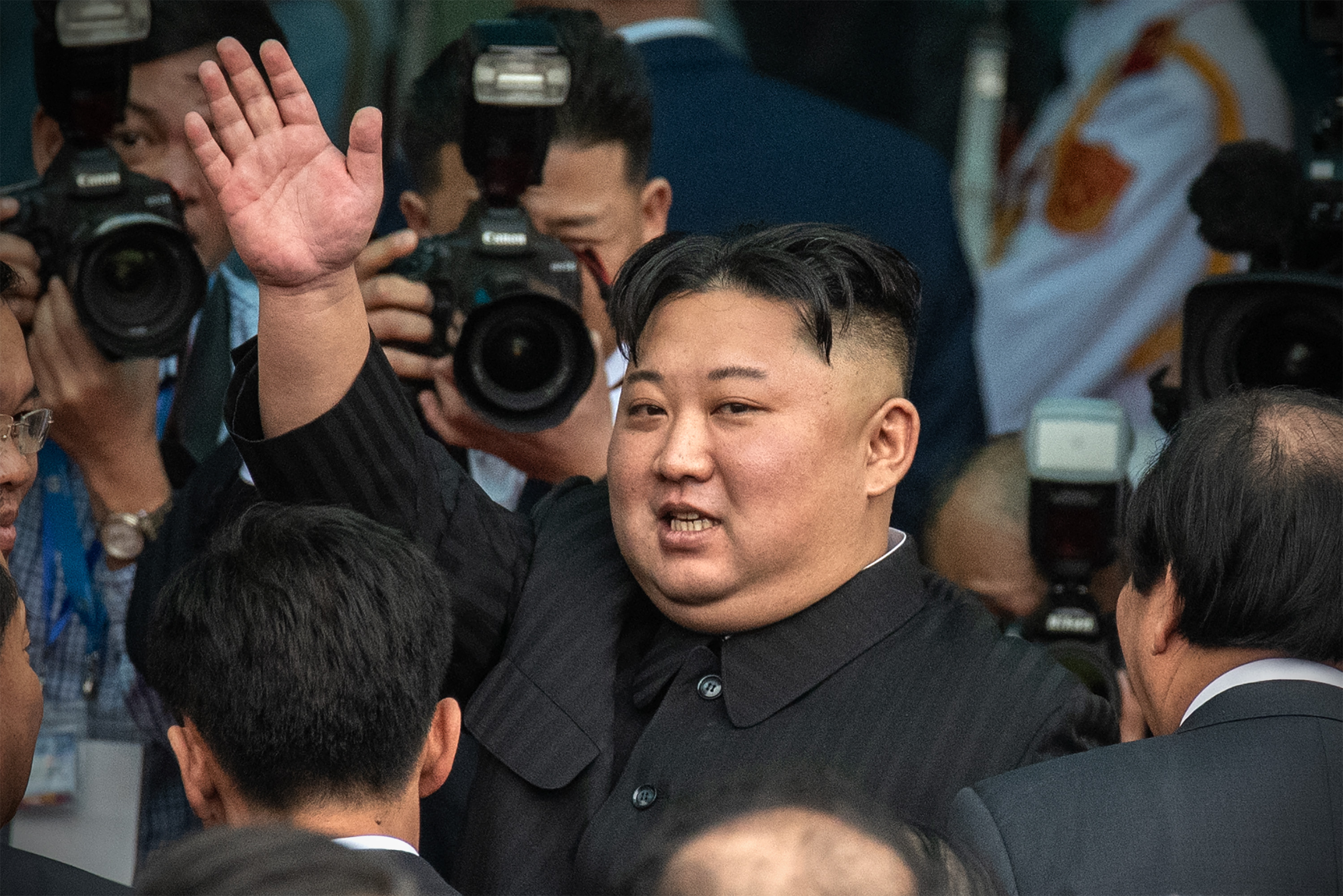 DONG DANG, VIETNAM - MARCH 02: North Korean leader Kim Jong-un waves as he prepares to leave Vietnam by train after a two day official visit preceded by the DPRK-USA Hanoi summit, on March 2, 2019 in Dong Dang, Vietnam. North Korean leader Kim Jong-un met with Vietnamese President Nguyen Phu Trong and Prime Minister Nguyen Xuan Phuc during his two-day official visit following a failed summit with U.S. President Donald Trump in Hanoi which ended without agreement. (Photo by Carl Court/Getty Images)