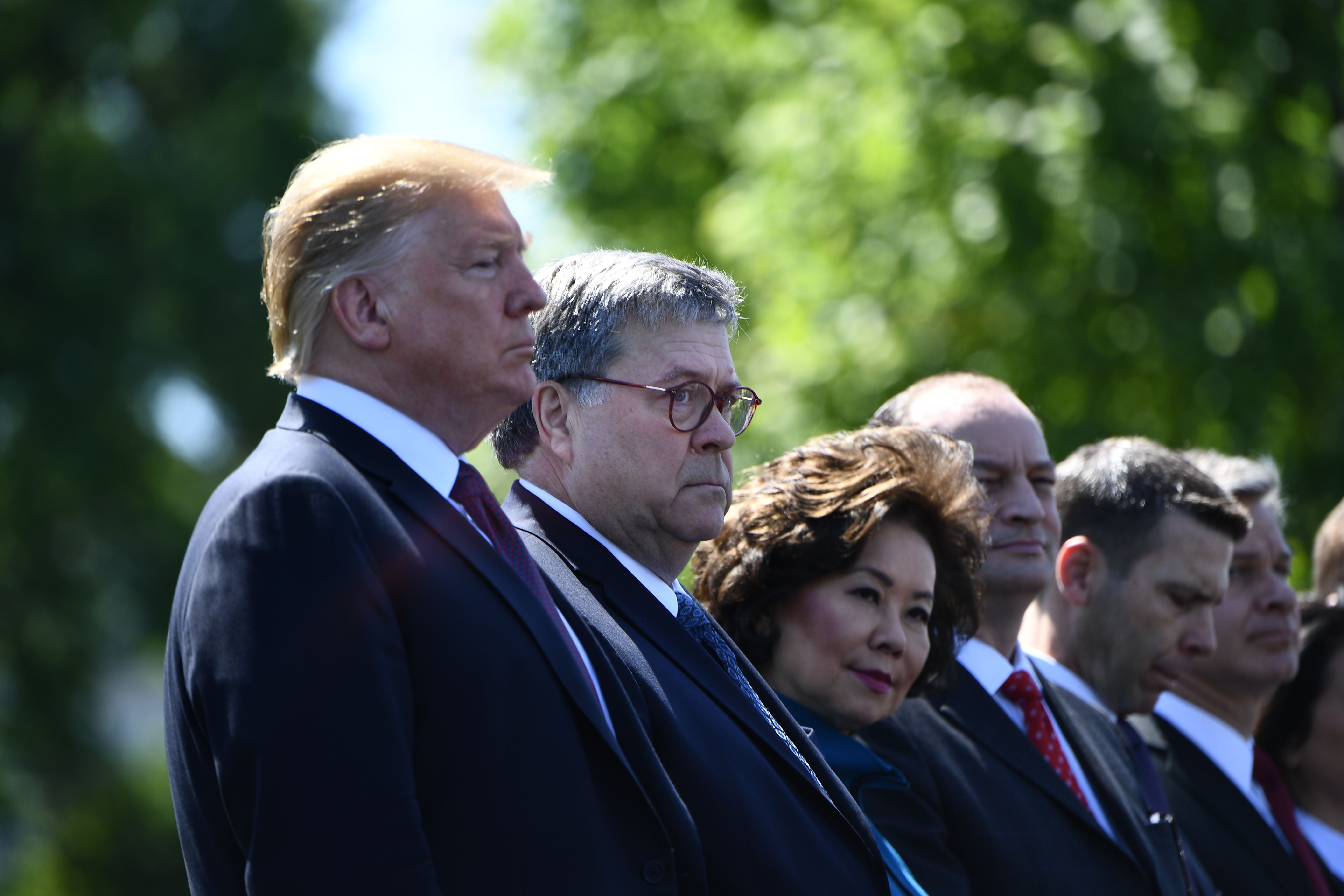 US President Donald Trump, Attorney General William Barr, Transportation Secretary Elaine Chao, Secretary of Labor Alex Acosta, Acting Secretary of Homeland Security Kevin McAleenan and FBI Director Christopher Wray attend the 38th Annual National Peace Officers Memorial Service on May 15, 2019, in Washington, DC. (BRENDAN SMIALOWSKI/AFP/Getty Images)