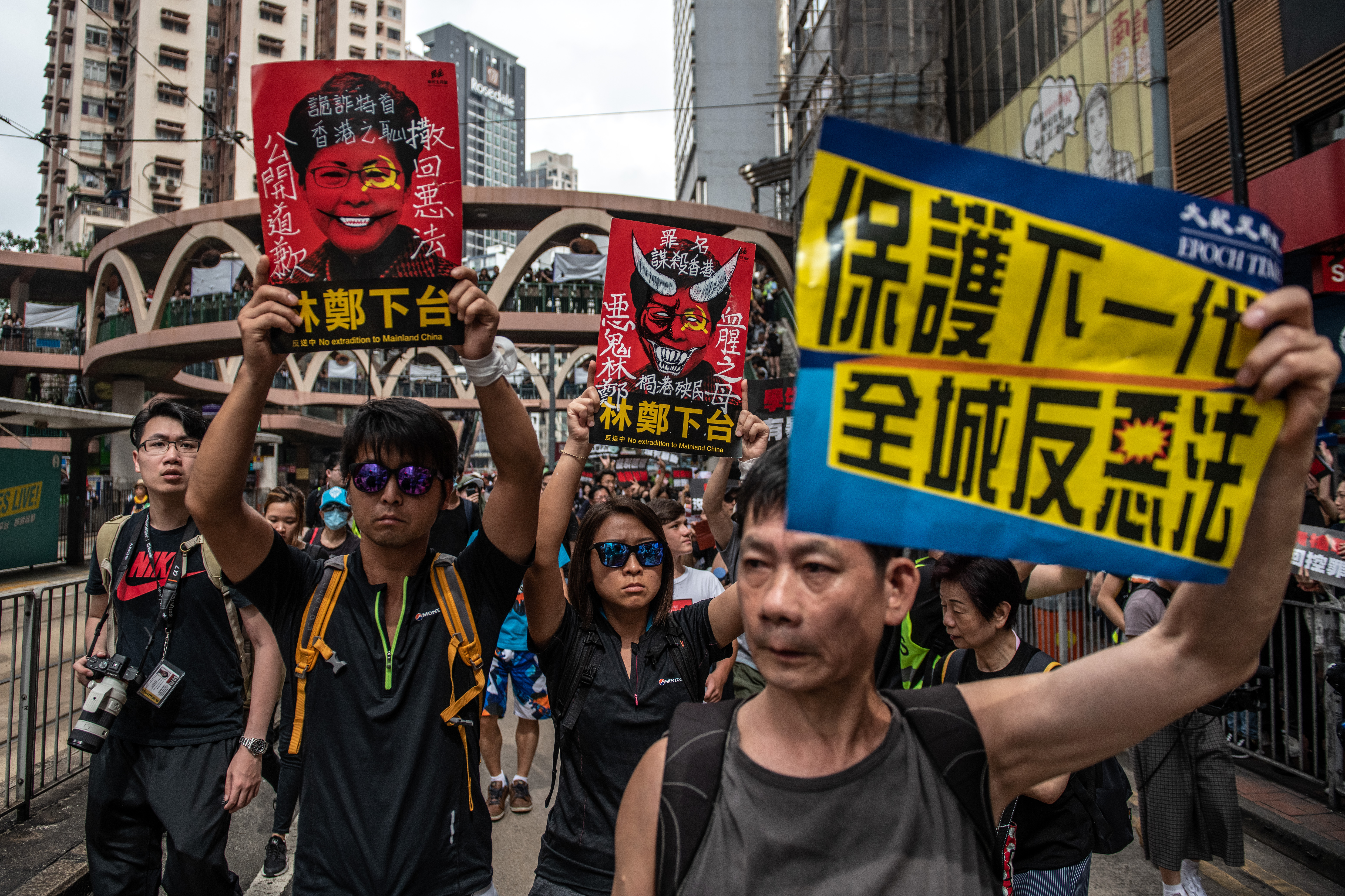 HONG KONG - JUNE 16: Protesters demonstrate against the now-suspended extradition bill on June 16, 2019 in Hong Kong. Large numbers of protesters rallied on Sunday despite an announcement yesterday by Hong Kong's Chief Executive Carrie Lam that the controversial extradition bill will be suspended indefinitely. (Photo by Carl Court/Getty Images)