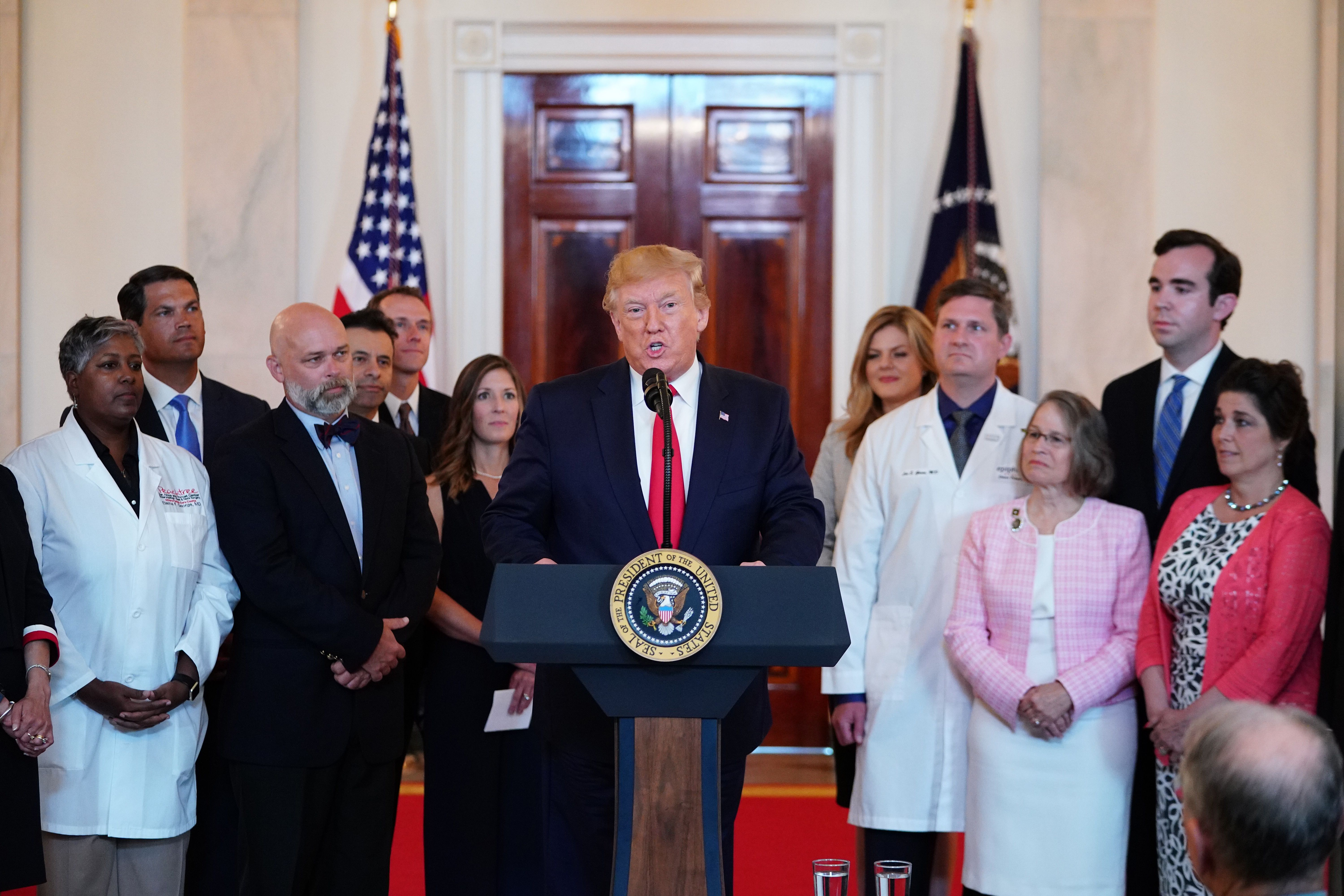 US President Donald Trump speaks before signing an executive order on "improving price and quality transparency in healthcare" in the Grand Foyer of the White House on June 24, 2019. (MANDEL NGAN/AFP/Getty Images)