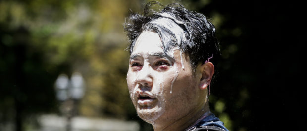 Andy Ngo, a Portland-based journalist, is seen covered in pepper spray and silly string after unidentified Rose City Antifa members attacked him on June 29, 2019 in Portland, Oregon. (Moriah Ratner/Getty Images)