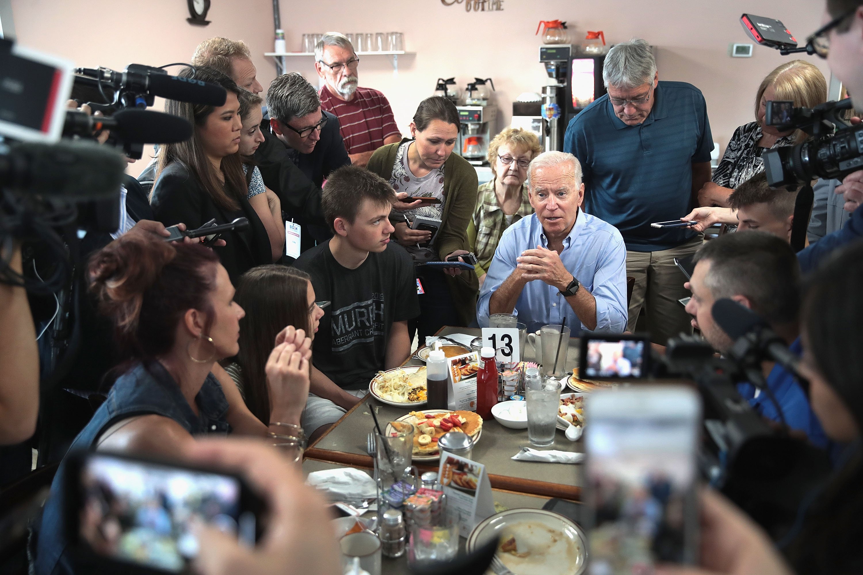 Democratic presidential candidate and former U.S. vice president Joe Biden speaks to diners at the Tasty Cafe during a quick campaign stop on June 12, 2019 in Eldridge, Iowa. (Photo by Scott Olson/Getty Images)