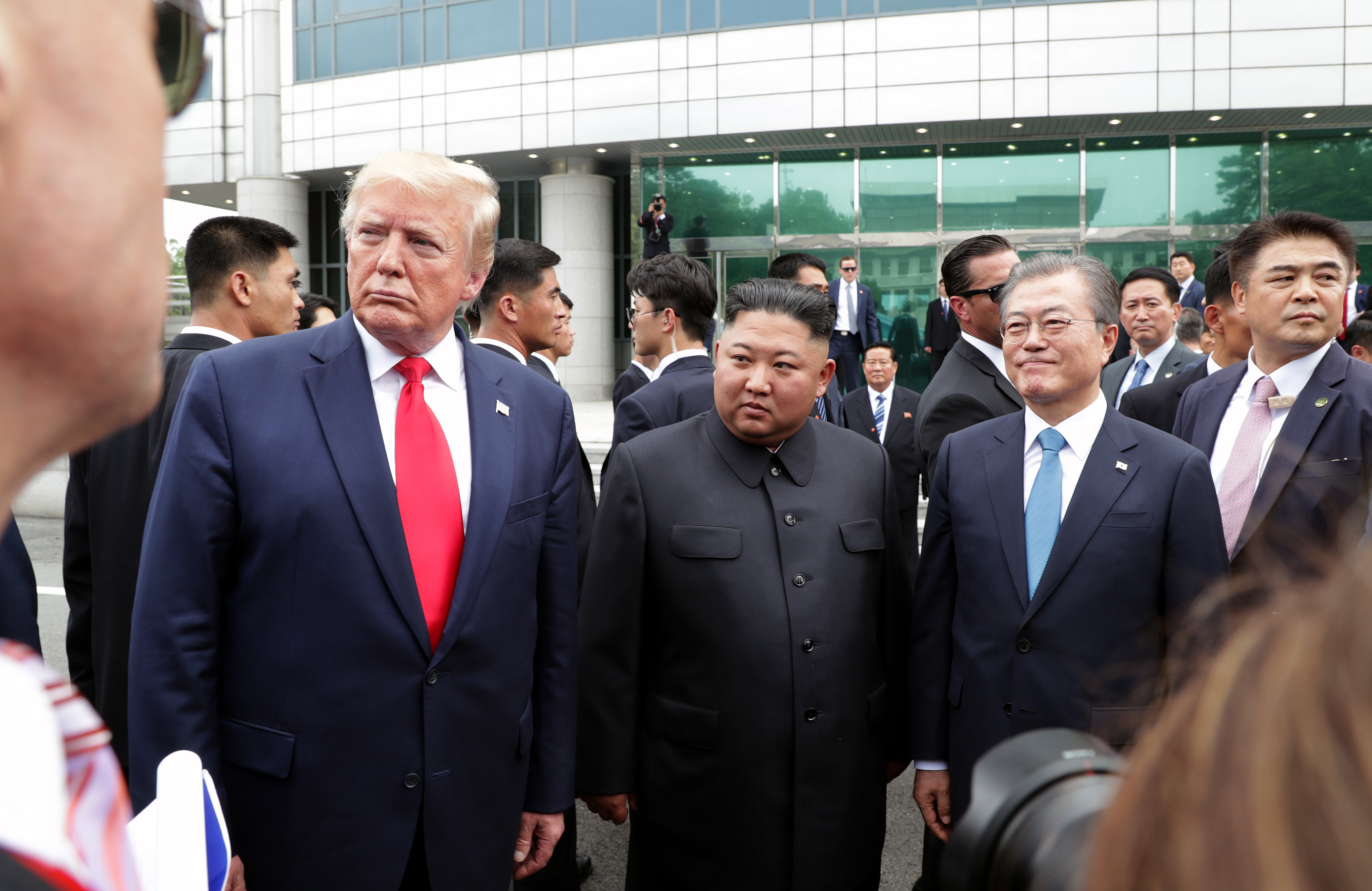 PANMUNJOM, SOUTH KOREA - JUNE 30: A handout photo provided by Dong-A Ilbo of North Korean leader Kim Jong Un, U.S. President Donald Trump, and South Korean President Moon Jae-in inside the demilitarized zone (DMZ) separating the South and North Korea on June 30, 2019 in Panmunjom, South Korea. U.S. President Donald Trump and North Korean leader Kim Jong-un briefly met at the Korean demilitarized zone (DMZ) on Sunday, with an intention to revitalize stalled nuclear talks and demonstrate the friendship between both countries. The encounter was the third time Trump and Kim have gotten together in person as both leaders have said they are committed to the "complete denuclearization" of the Korean peninsula. (Photo by Handout/Dong-A Ilbo via Getty Images)