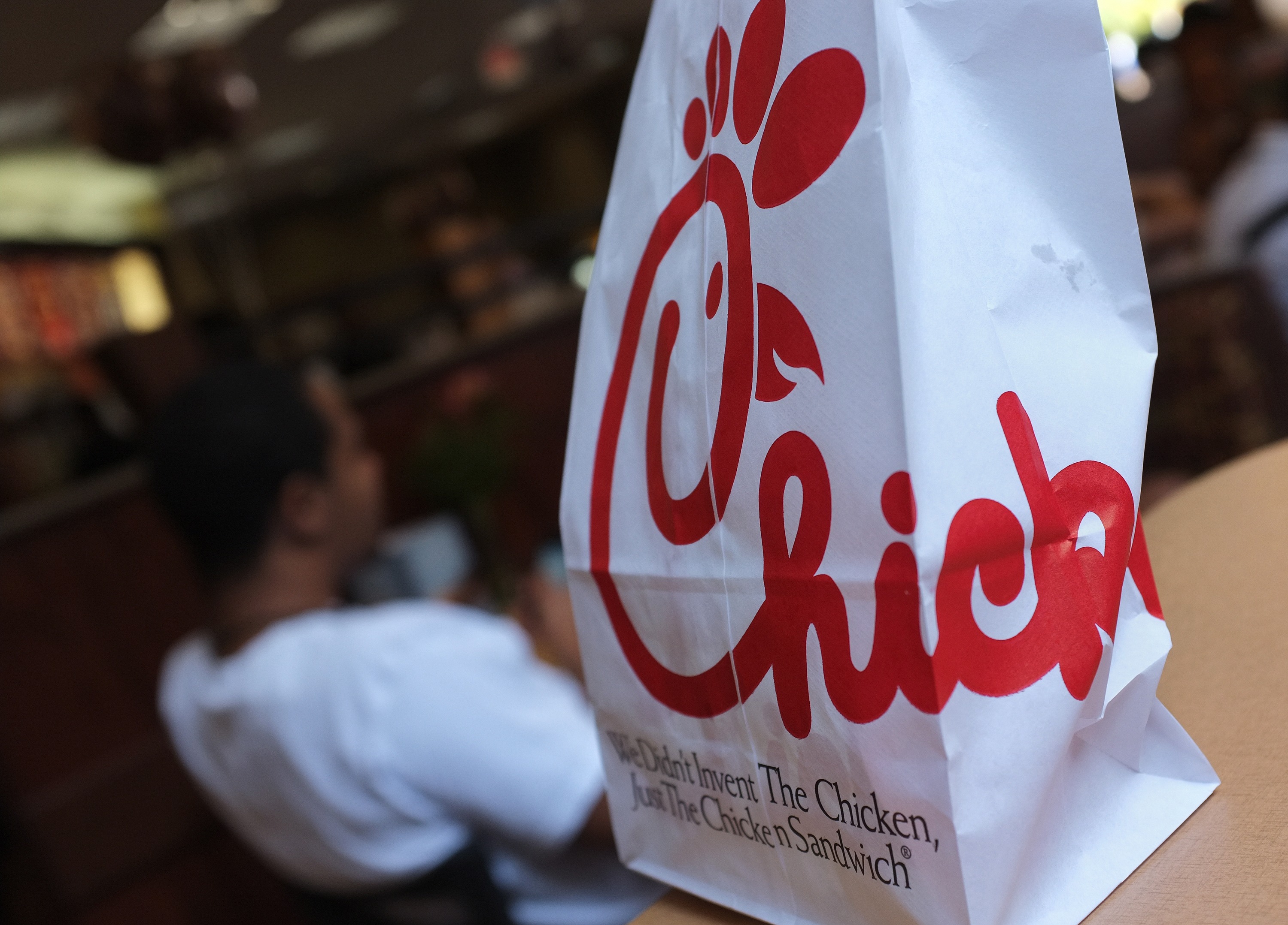 A Chick-fil-A logo is seen on a take out bag at one of its restaurants on July 28, 2012 in Bethesda, Maryland. Chick-fil-A, with more than 1,600 outlets mainly in the southern United States, has become the target of gay rights activists and their allies after president Dan Cathy came out against same-sex marriage last week. (MANDEL NGAN/AFP/GettyImages)