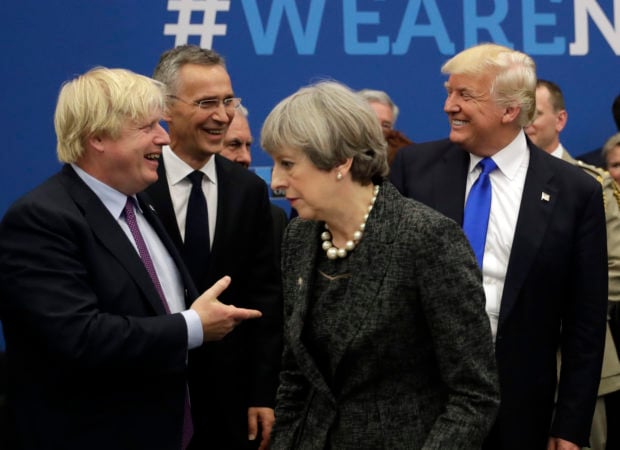 (L-R) British Secretary for Foreign Affairs Boris Johnson, NATO Secretary General Jens Stoltenberg, Britain's Prime Minister Theresa May, and US President Donald Trump arrive for a working dinner meeting at the NATO (North Atlantic Treaty Organization) summit at the NATO headquarters, in Brussels, on May 25, 2017. / AFP PHOTO / POOL / Matt Dunham (Photo credit should read MATT DUNHAM/AFP/Getty Images)