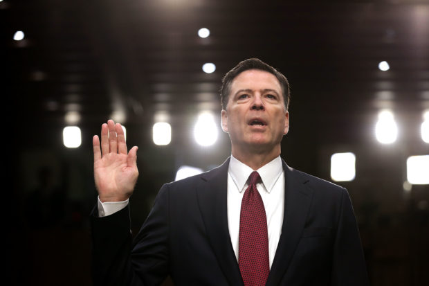 Former FBI Director James Comey is sworn in before giving testimony to the Senate Intelligence Committee on June 8, 2017. (Chip Somodevilla/Getty Images)
