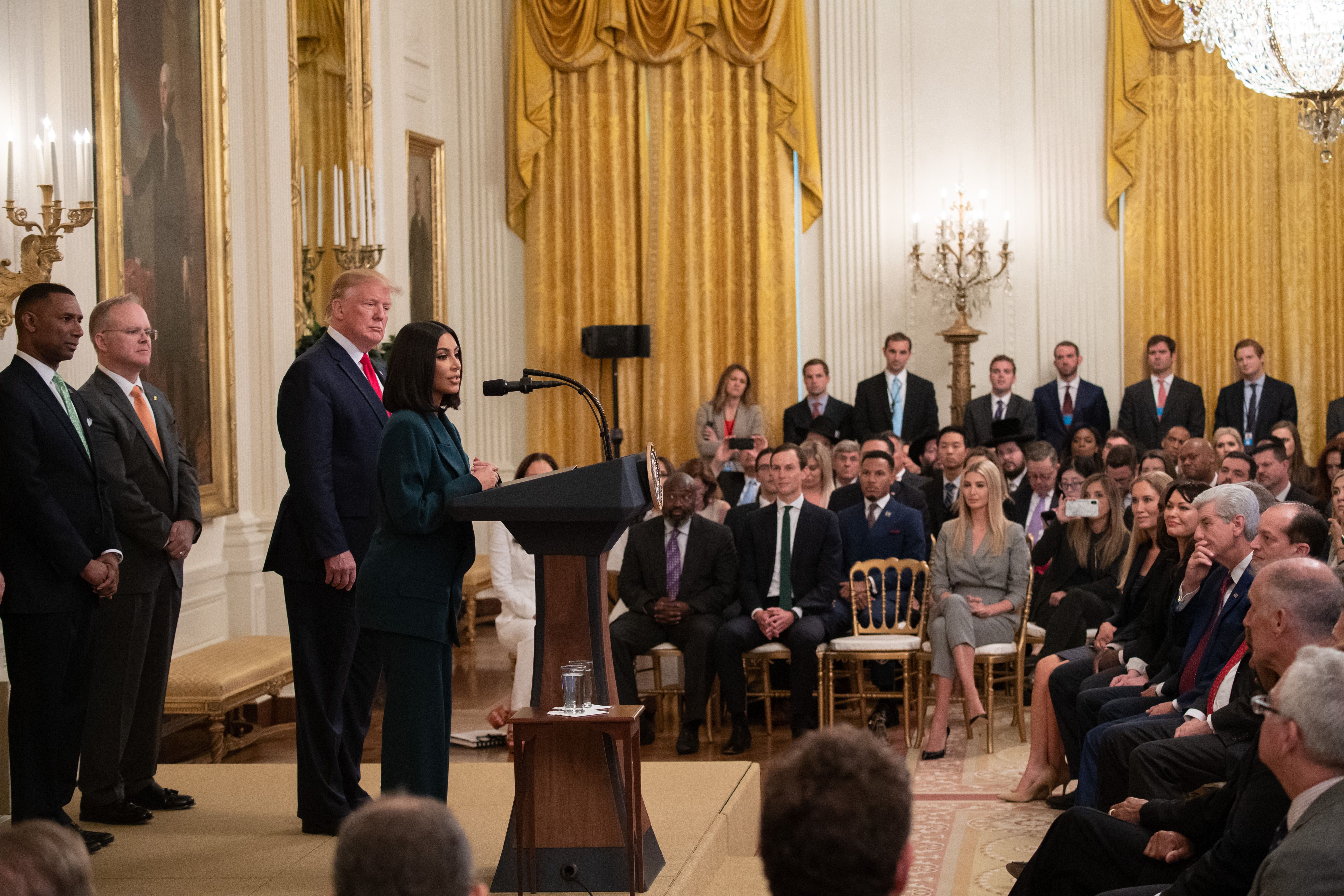 Kim Kardashian speaks alongside US President Donald Trump during a second chance hiring and criminal justice reform event in the East Room of the White House in Washington, DC, June 13, 2019. (Photo credit SAUL LOEB/AFP/Getty Images)