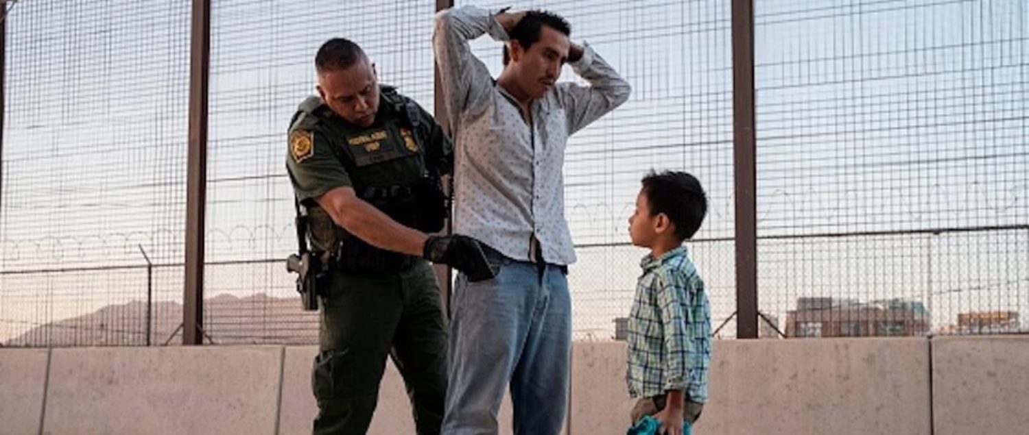 Jos?, 27, with his son Jos? Daniel, 6, is searched by US Customs and Border Protection Agent Frank Pino, May 16, 2019, in El Paso, Texas. Father and son spent a month trekking across Mexico from Guatemala. - About 1,100 migrants from Central America and other countries are crossing into the El Paso border sector each day. US Customs and Border Protection Public Information Officer Frank Pino, says that Border Patrol resources and personnel are being stretched by the ongoing migrant crisis, and that the real targets of the Border Patrol are slipping through the cracks. (Photo by Paul Ratje / AFP) (Photo credit should read PAUL RATJE/AFP/Getty Images)
