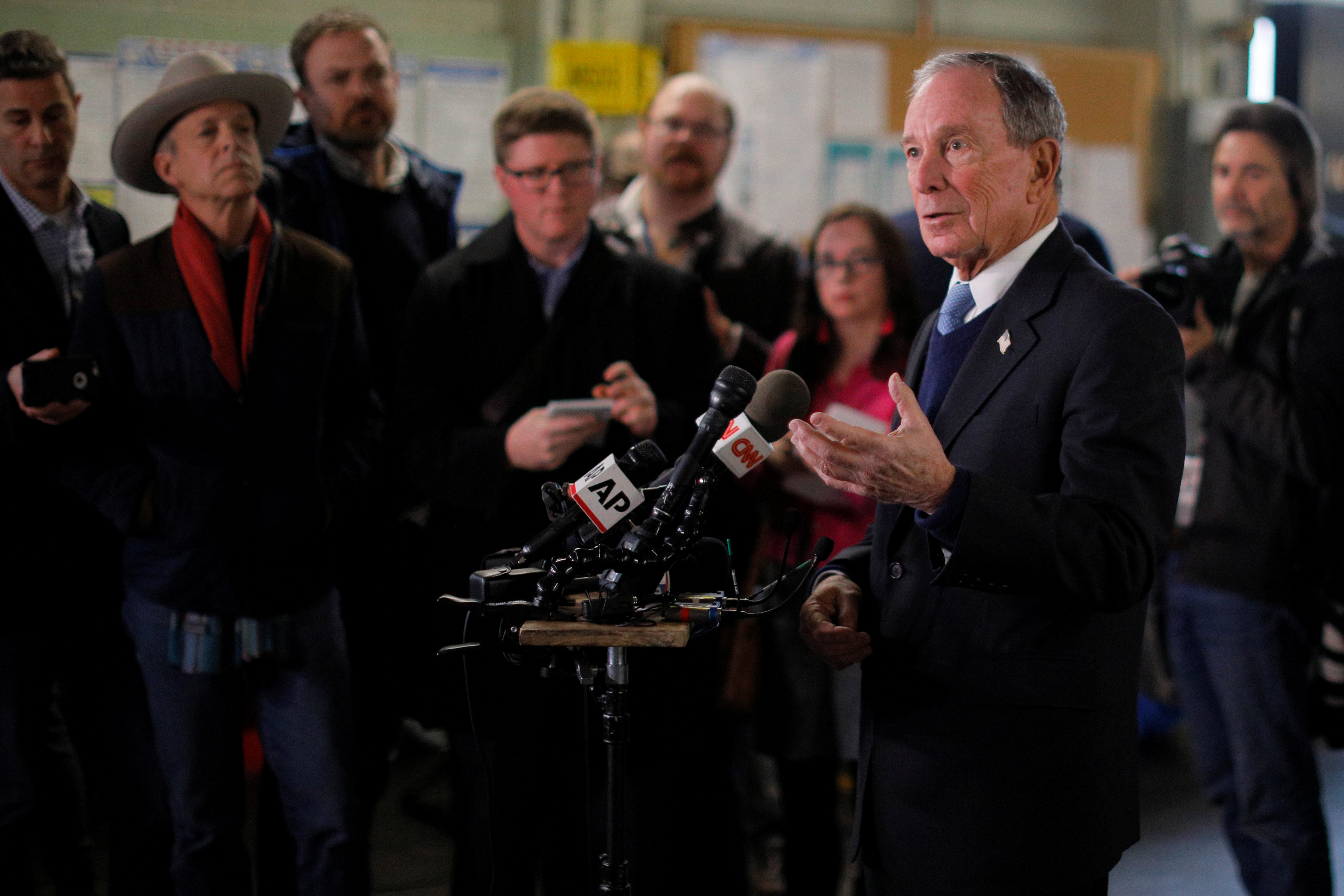 Former New York City Mayor Bloomberg answers questions from reporters in Nashua