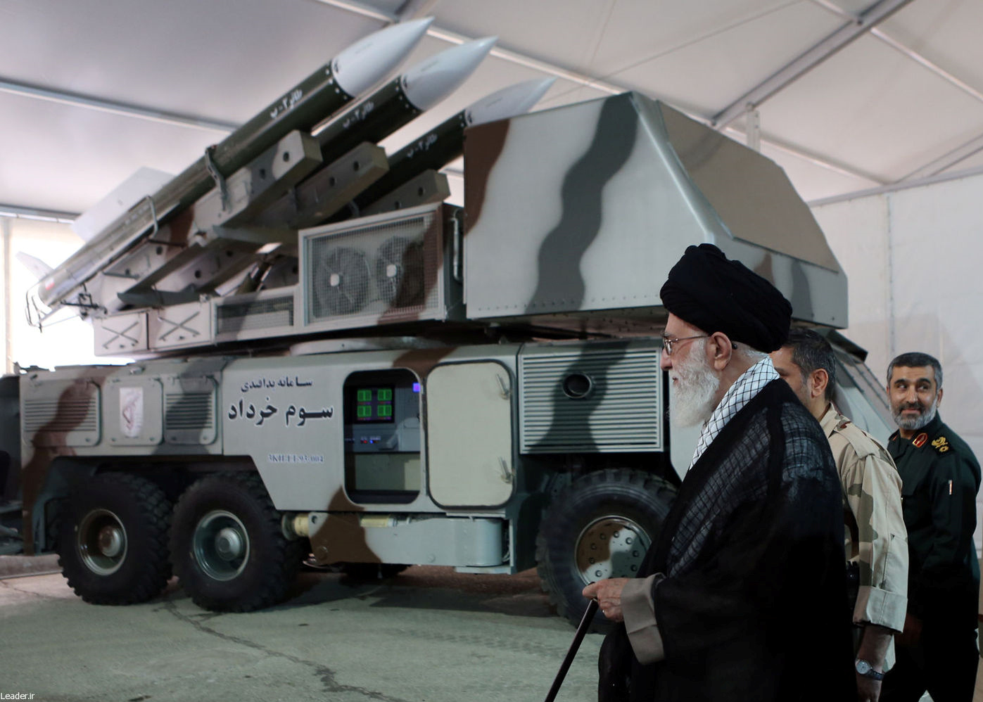 Iran's Supreme Leader Ayatollah Ali Khamenei is seen near a "3 Khordad" system which is said to had been used to shoot down a U.S. military drone