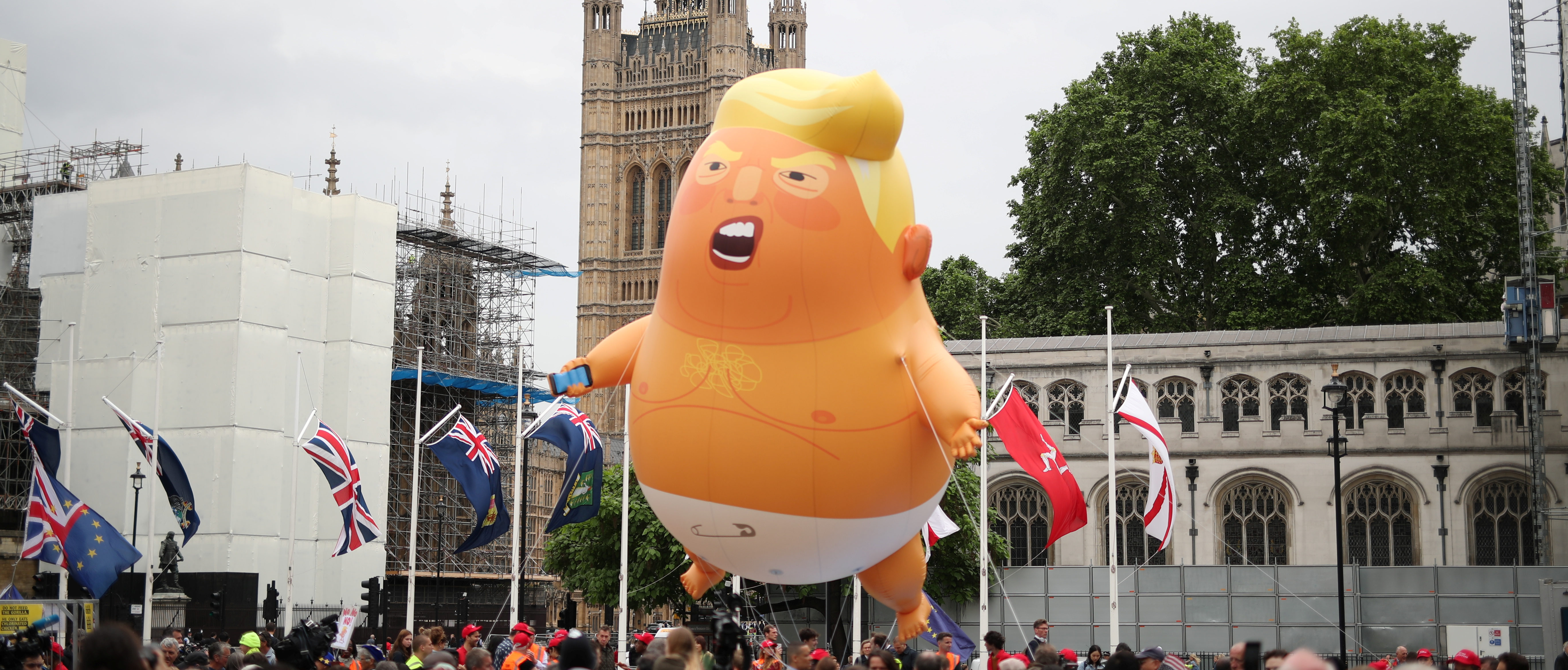 A "Baby Trump" balloon flies over demonstrators as they take part in an anti-Trump protest in London, Britain, June 4, 2019. REUTERS/Alkis Konstantinidis