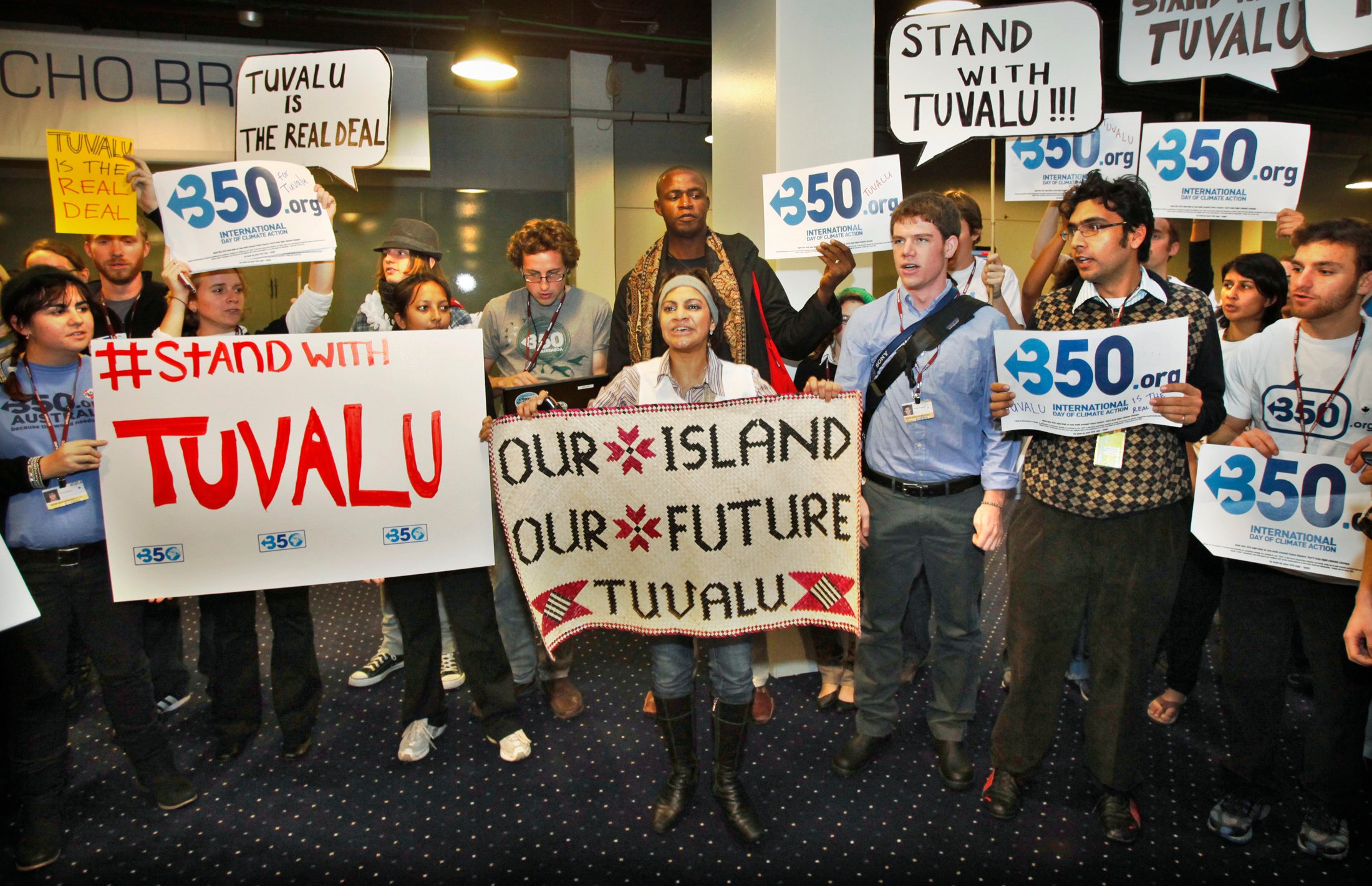 Activists hold a demonstration in support of Tuvalu at the UN Climate Change Conference 2009 in Copenhagen