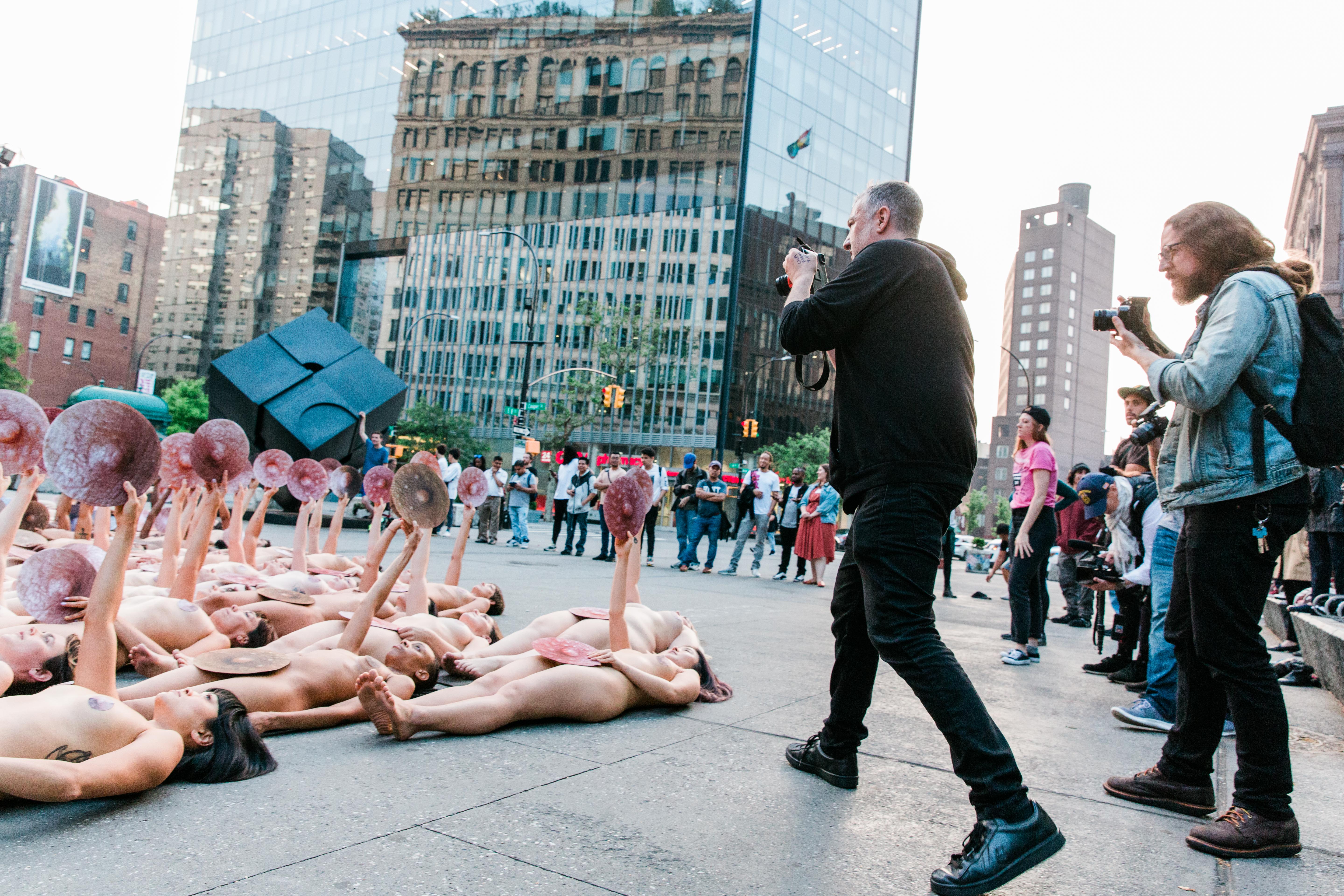 Artist Spencer Tunick took photos as part of a protest against Facebook's censorship policies on Sunday morning in New York. (Fay Fox)
