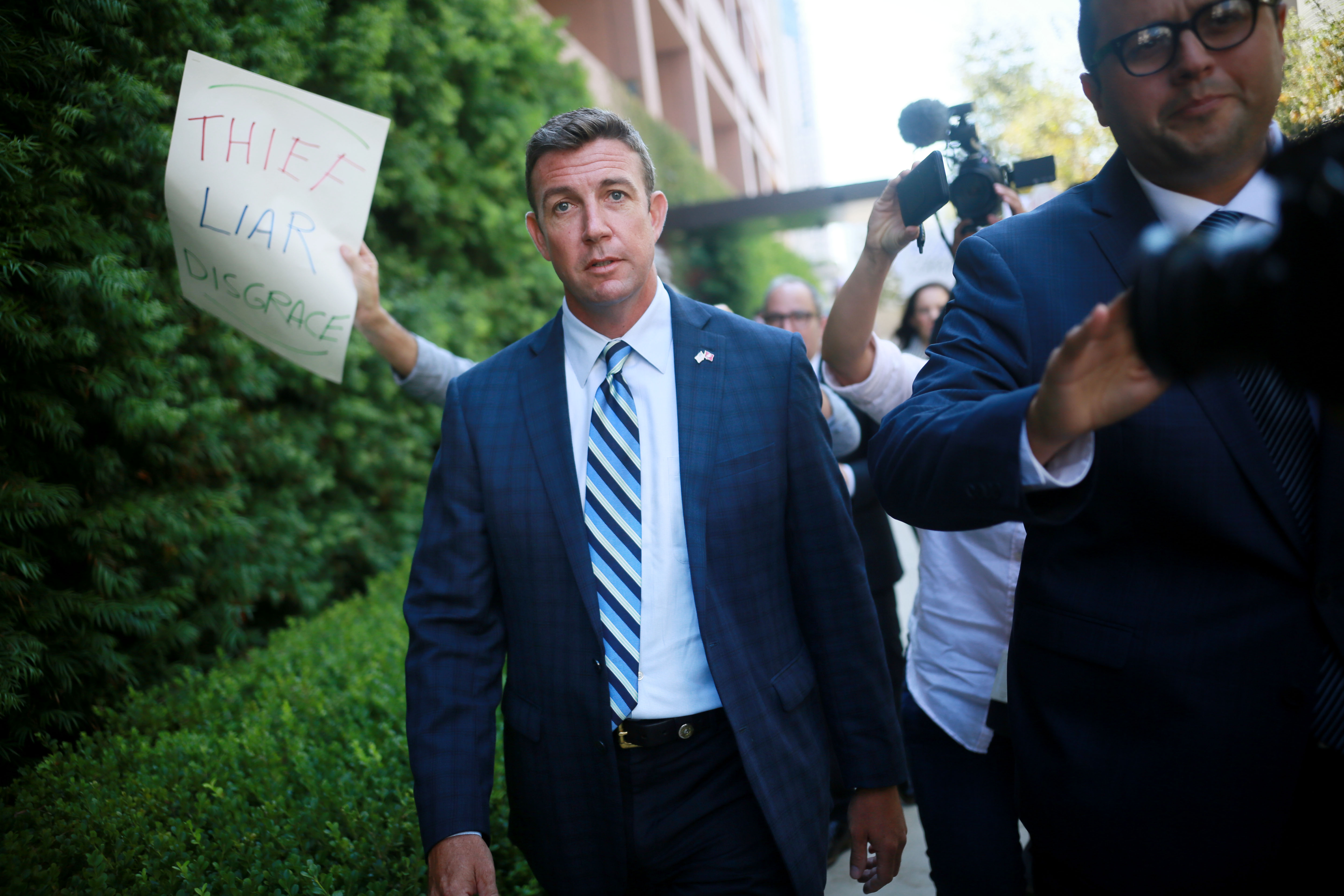 SAN DIEGO, CA - AUGUST 23: Congressman Duncan Hunter walks out of the San Diego Federal Courthouse after an arraignment hearing on Thursday, August 23, 2018 in San Diego, CA. Hunter and his wife Margaret, who pled "not guilty", are accused of using more than 250,000 in campaign funds for personal use. (Photo by Sandy Huffaker/Getty Images)