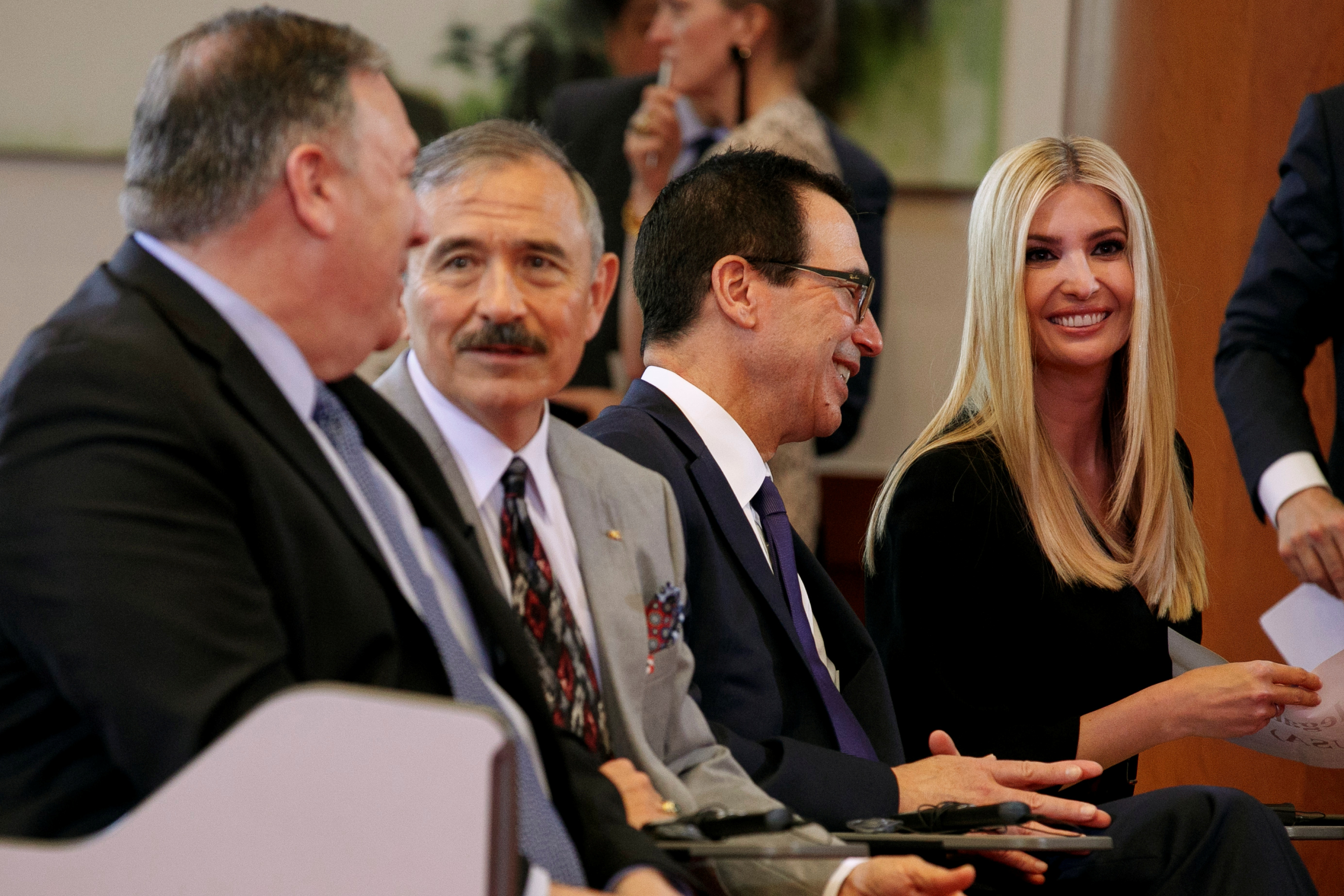 U.S. Secretary of State Mike Pompeo, left, U.S. Ambassador to South Korea Harry Harris, Treasury Secretary Steve Mnuchin, and White House Adviser Ivanka Trump, chat together before a news conference by President Donald Trump and South Korean President Moon Jae-in, at Blue House, in Seoul, South Korea, Sunday, June 30, 2019, before heading to the demilitarized zone. Photo taken June 30, 2019. Jacquelyn Martin/Pool via REUTERS