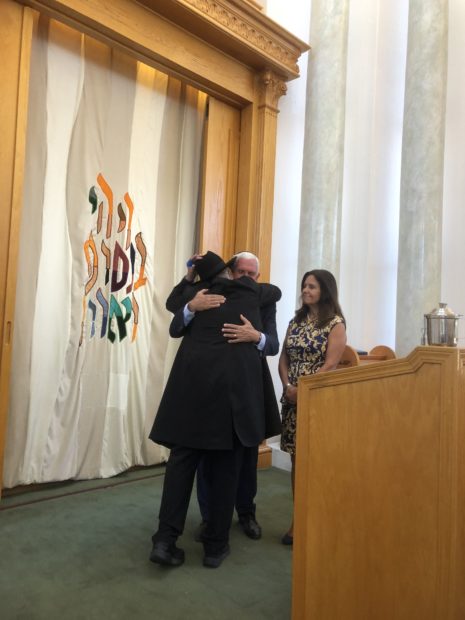 Rabbi Goldstein hugs VP Mike Pence At Chabad of Poway (WH Print Pool, Josh Dawsey)