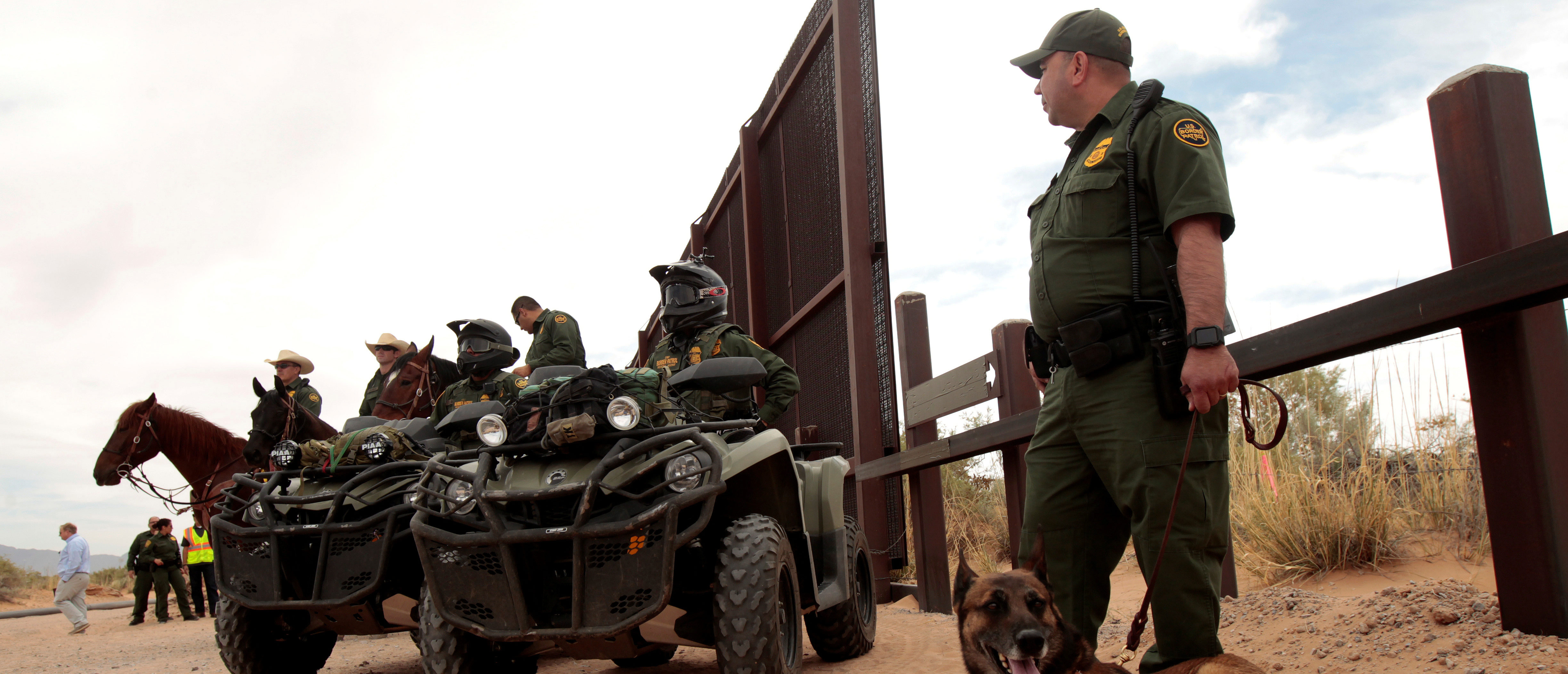 Border Patrol agents keep watch during the official start for the construction of new bollard wall to replace 20-miles of primary vehicle barriers in Santa Teresa, New Mexico, United States April 9, 2018. REUTERS/Jose Luis Gonzalez