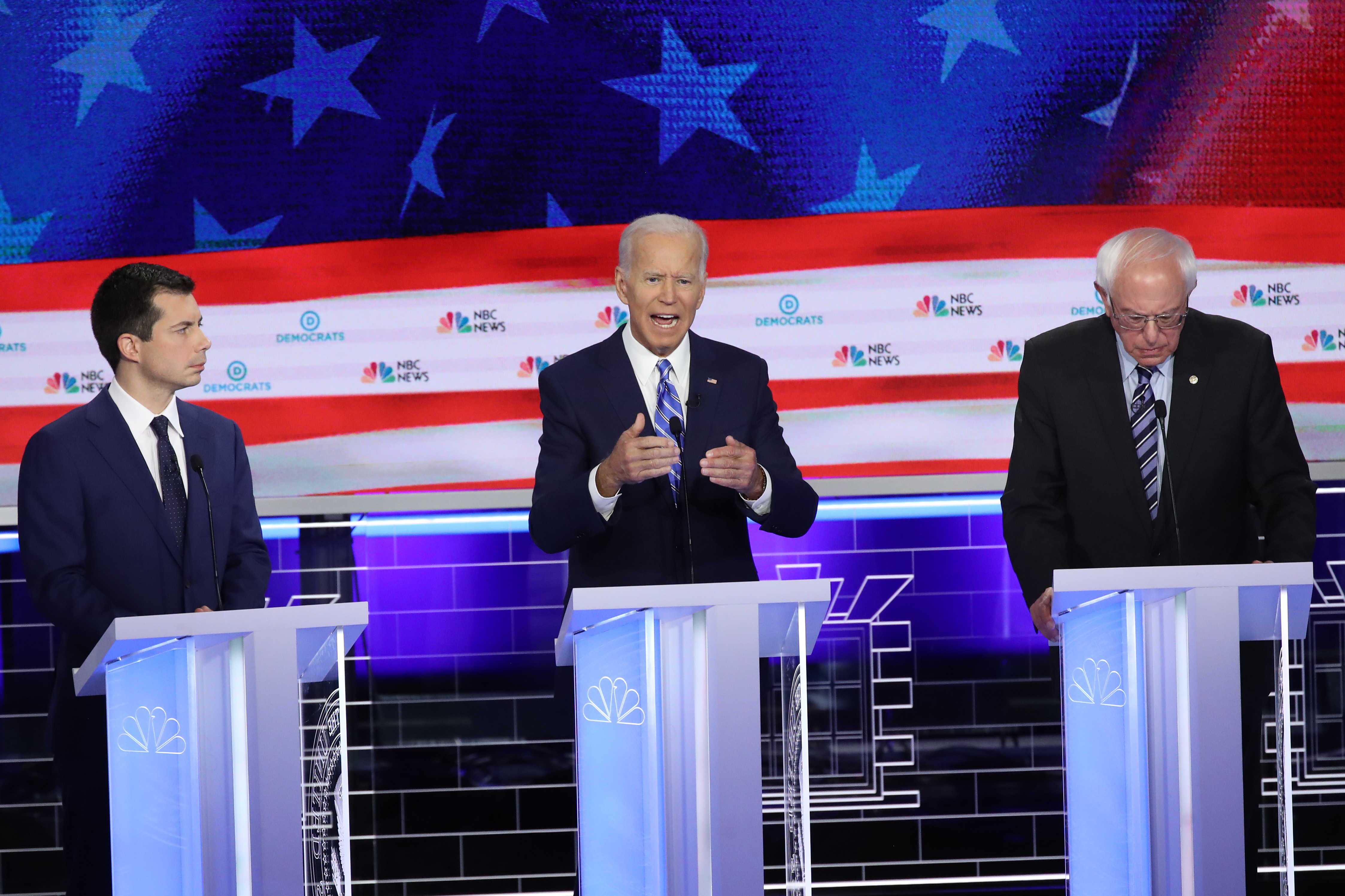MIAMI, FLORIDA - JUNE 27: Democratic presidential candidates (L-R) South Bend, Indiana Mayor Pete Buttigieg, former Vice President Joe Biden and Sen. Bernie Sanders (I-VT) take part in the second night of the first Democratic presidential debate on June 27, 2019 in Miami, Florida. (Photo by Drew Angerer/Getty Images)