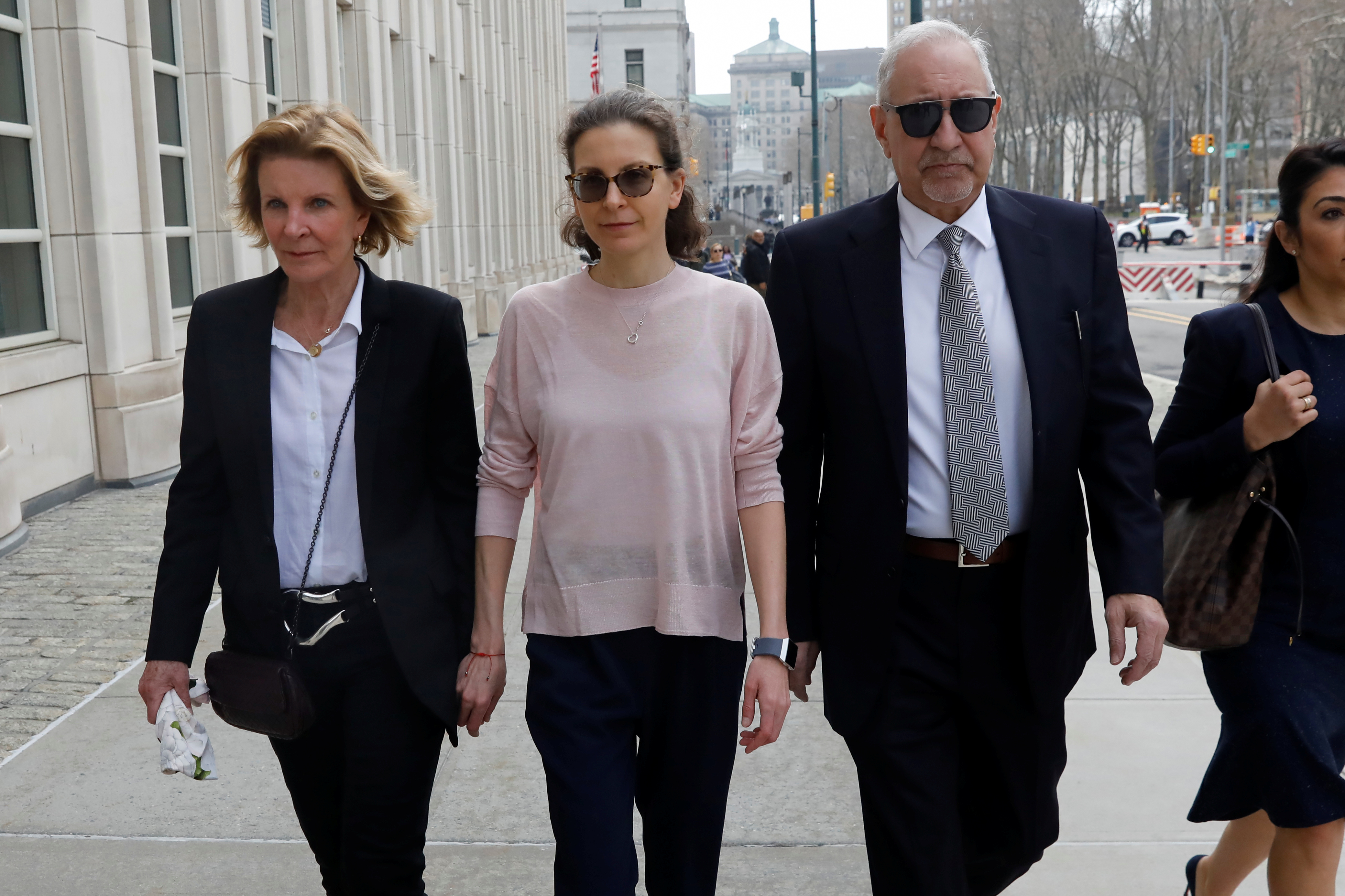 Clare Bronfman, an heiress of the Seagram's liquor empire, arrives at the Brooklyn Federal Courthouse to face charges regarding sex trafficking and racketeering related to the Nxivm cult case in New York, U.S., April 8, 2019. REUTERS/Shannon Stapleton