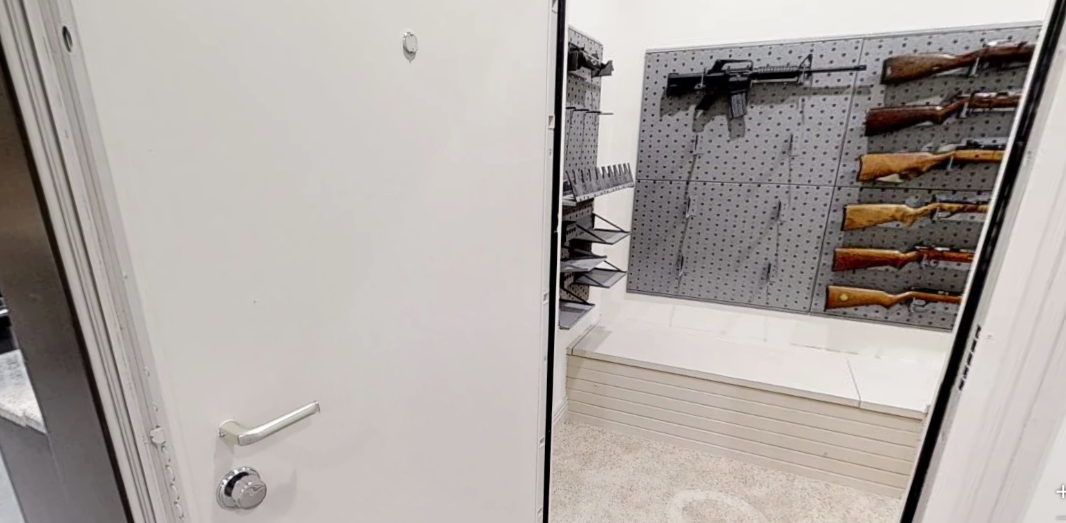 The gun room inside a home being sold by Michelle and Jim Bob Duggar. The 10,000-square foot property in Springdale, Arkansas includes three kitchens and a 3,500 square foot garage. Photo courtesy of Realtor.com