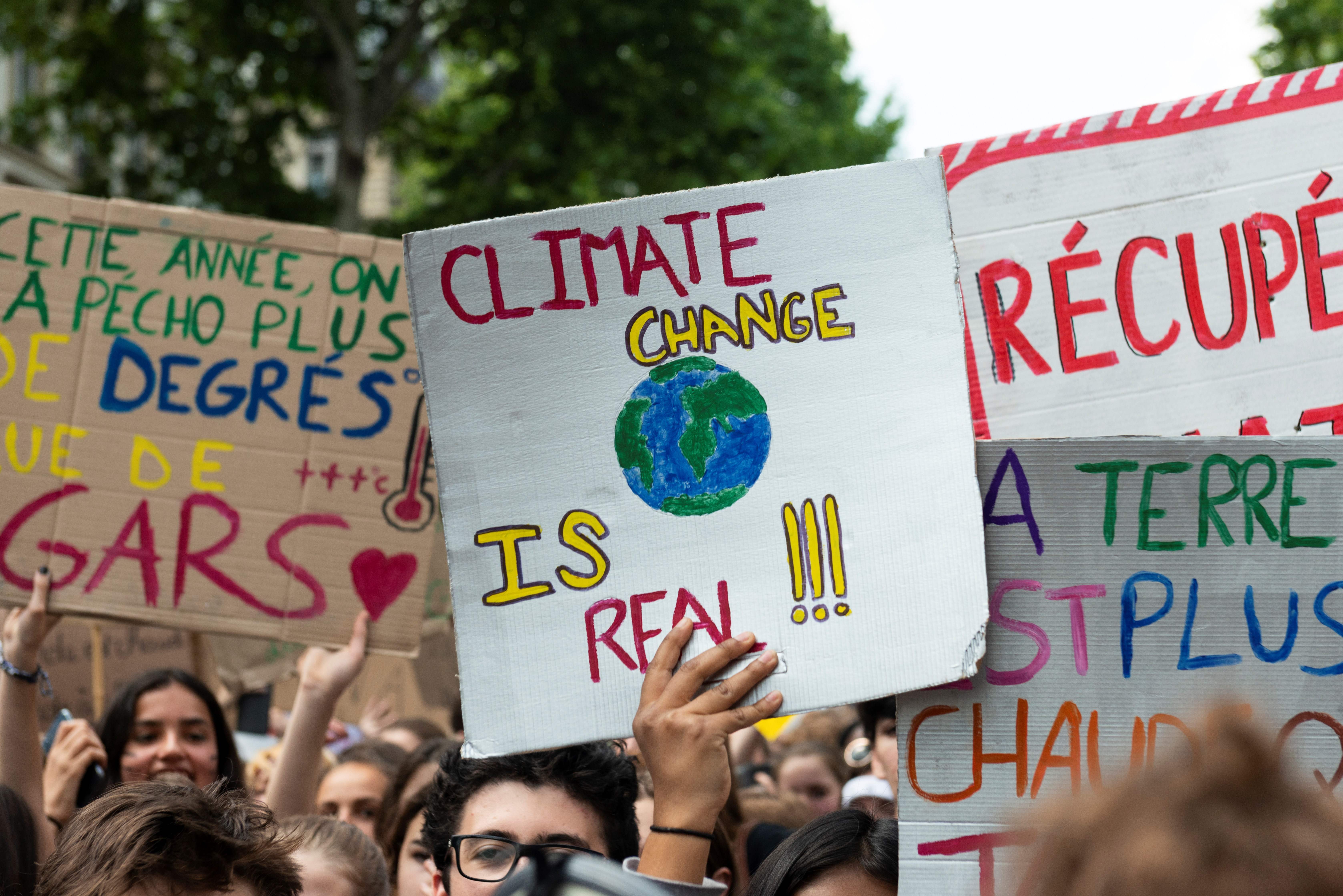 Youths take part in a protest demanding urgent action against global warming, as part of the worldwide youth campaign ahead of the EU elections, on May 24, 2019, in Paris. (Photo by - / AFP) (Photo credit should read -/AFP/Getty Images)