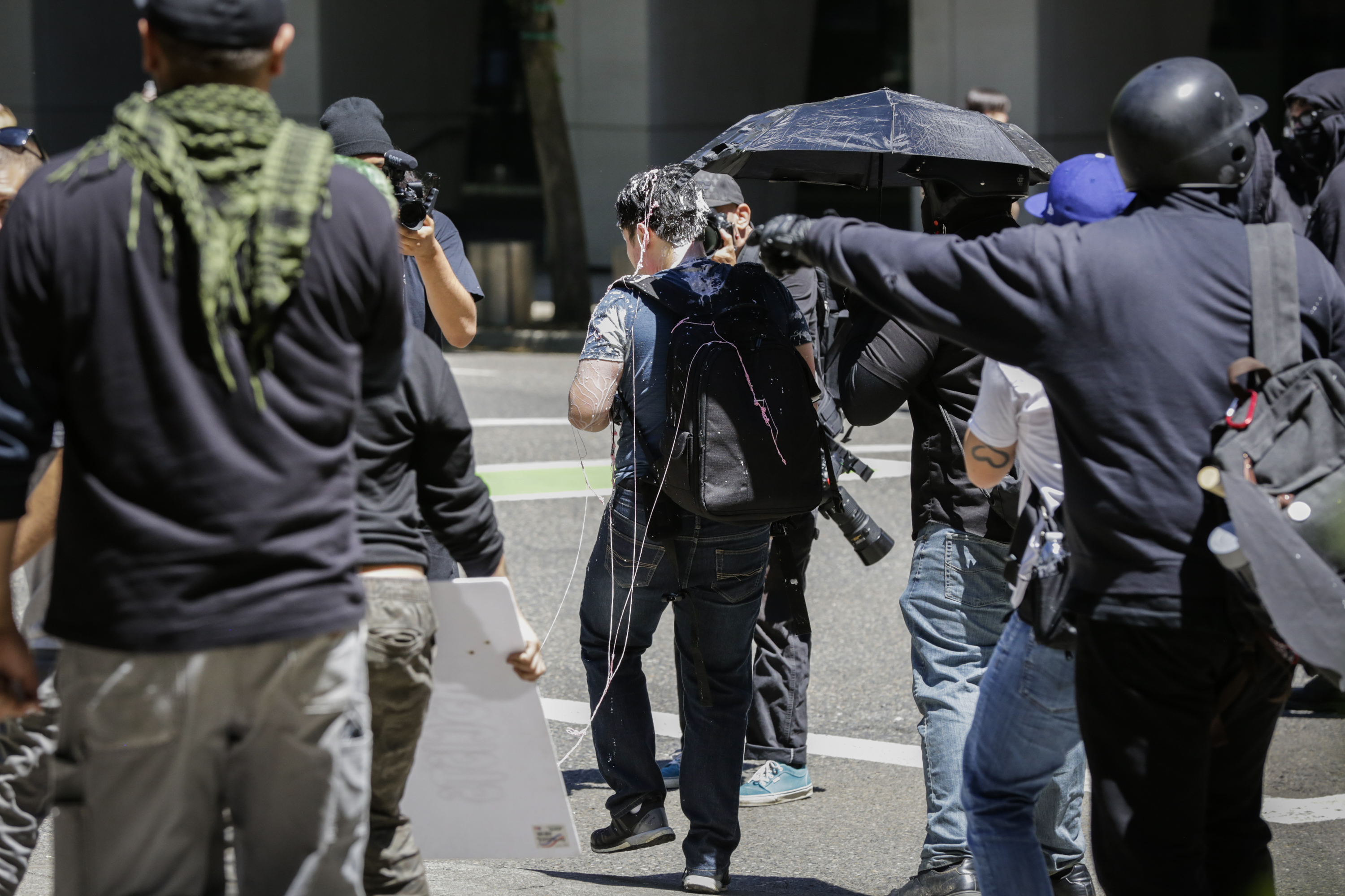 Andy Ngo, a Portland-based journalist, is seen covered in an unknown substance after unidentified Rose City Antifa members attacked him on June 29, 2019 in Portland, Oregon. (Moriah Ratner/Getty Images)