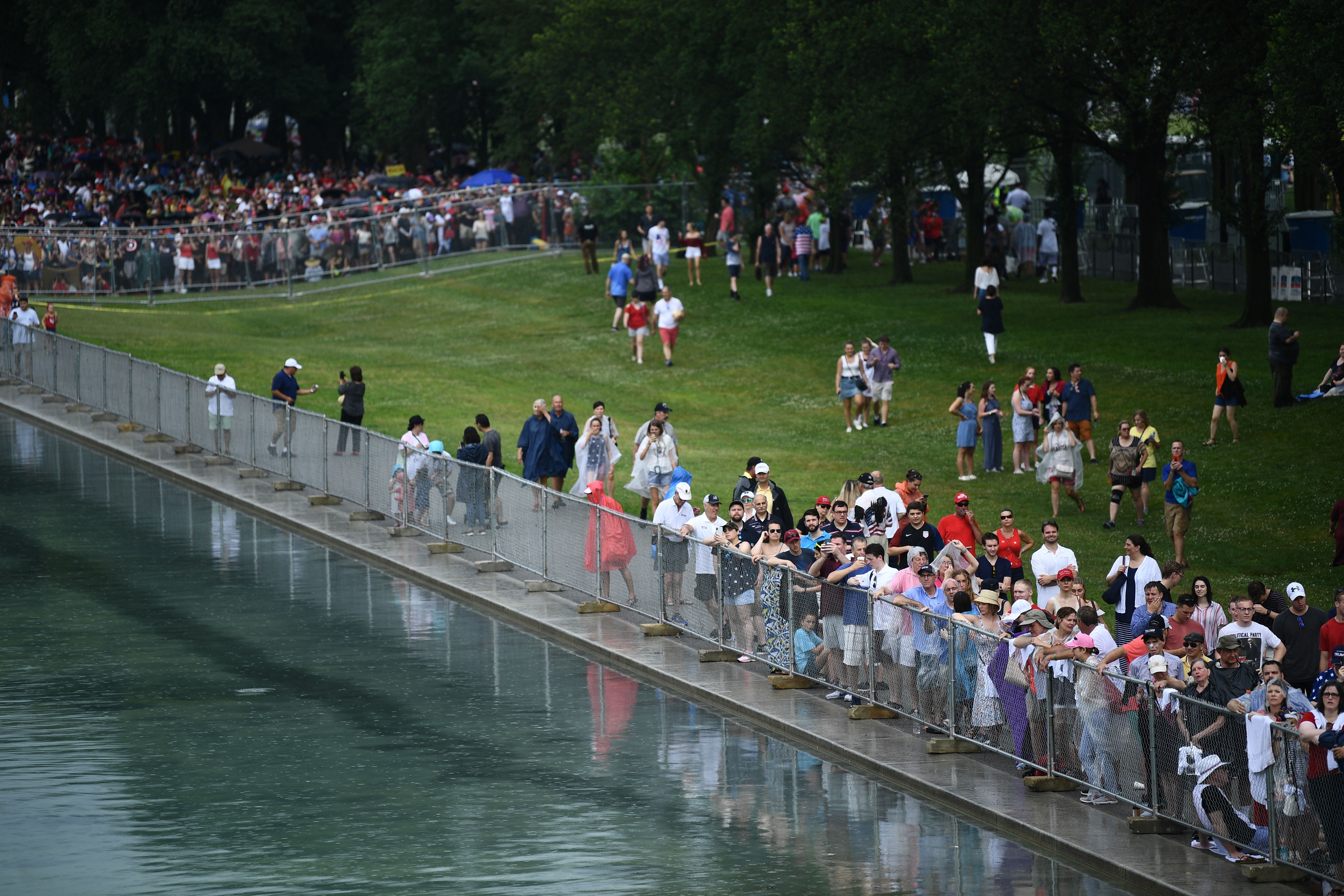Crowds gathered in the back end of the VIP section after areas alongside the Reflecting Pool open to the general public had already been filled. (BRENDAN SMIALOWSKI/AFP/Getty Images)