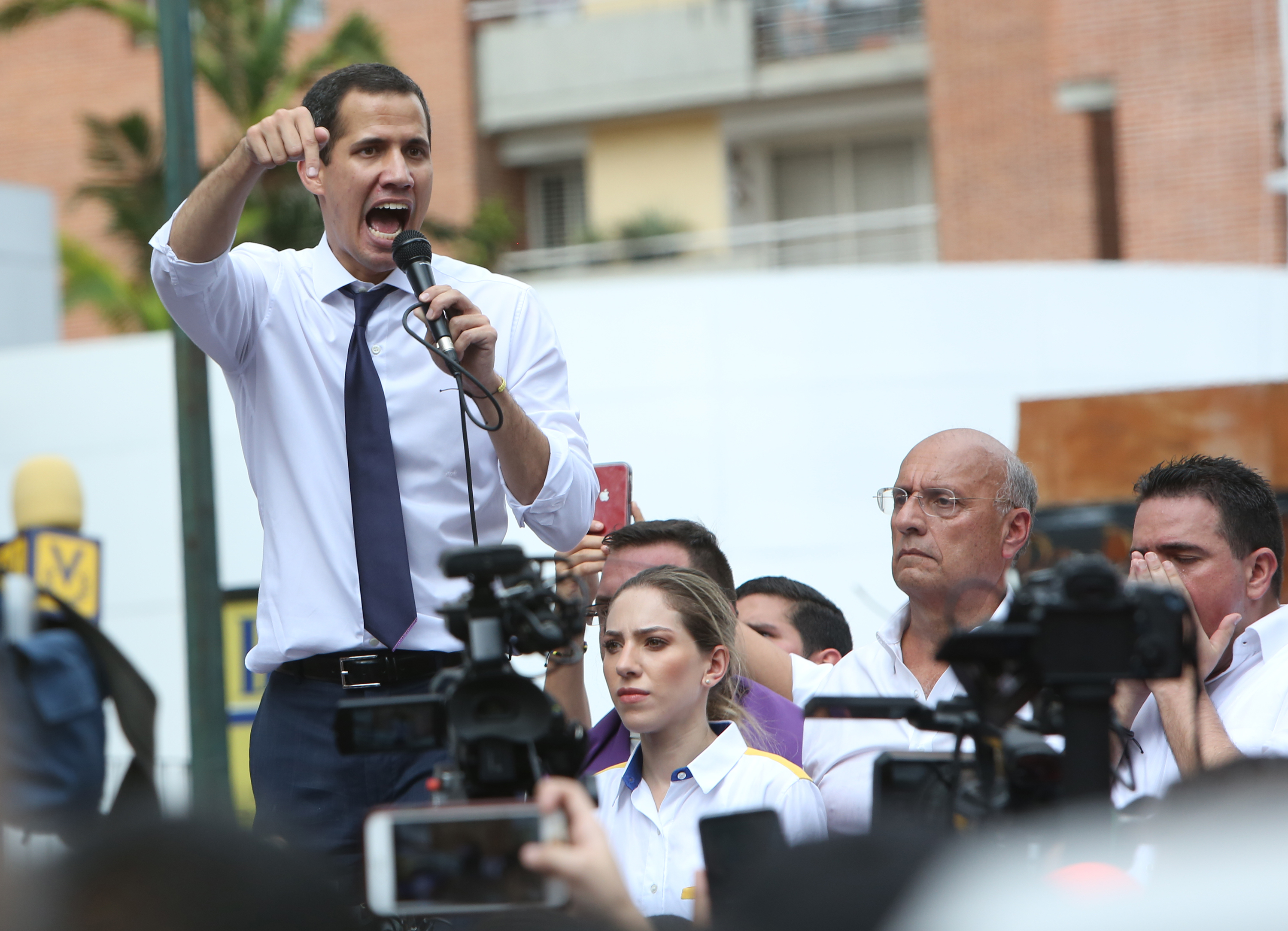 Opposition leader and president of the National Assembly Juan Guaidó speaks at the end of a demonstration near the DGCIM as part of the 208th anniversary of the Venezuelan Independence declaration. (Edilzon Gamez/Getty Images)