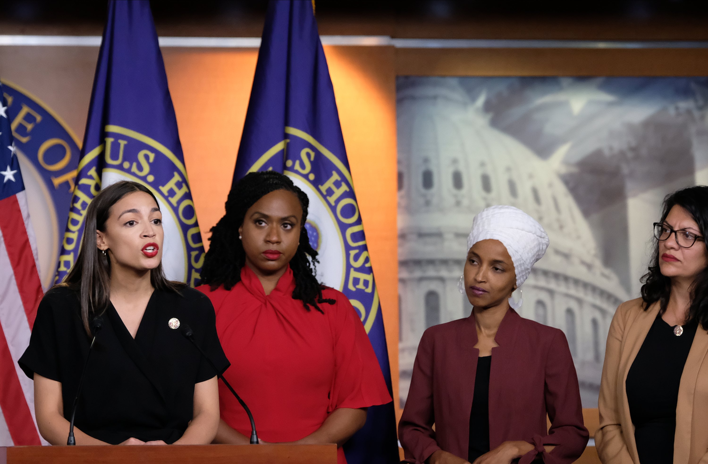 U.S. Rep. Alexandria Ocasio-Cortez speaks as Reps. Ayanna Pressley, Ilhan Omar and Rashida Tlaib listen during a news conference at the U.S. Capitol on July 15, 2019 in Washington, DC. (Photo by Alex Wroblewski/Getty Images)