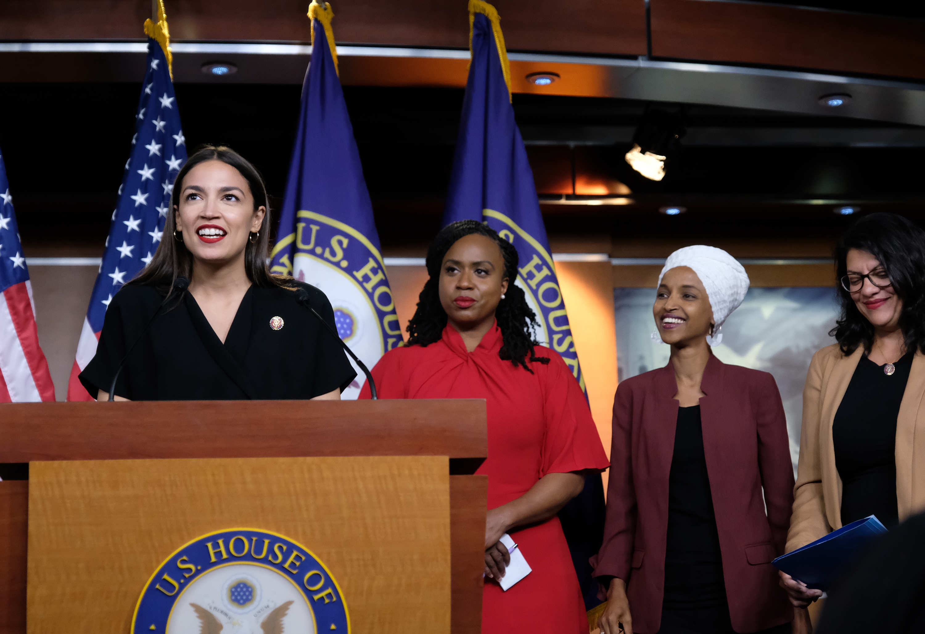 U.S. Rep. Alexandria Ocasio-Cortez (D-NY) speaks as Reps. Ayanna Pressley (D-MA), Ilhan Omar (D-MN), and Rashida Tlaib (D-MI) listen during a press conference at the U.S. Capitol on July 15, 2019 in Washington, DC. President Donald Trump stepped up his attacks on four progressive Democratic congresswomen, saying if they're not happy in the United States "they can leave." (Photo by Alex Wroblewski/Getty Images)