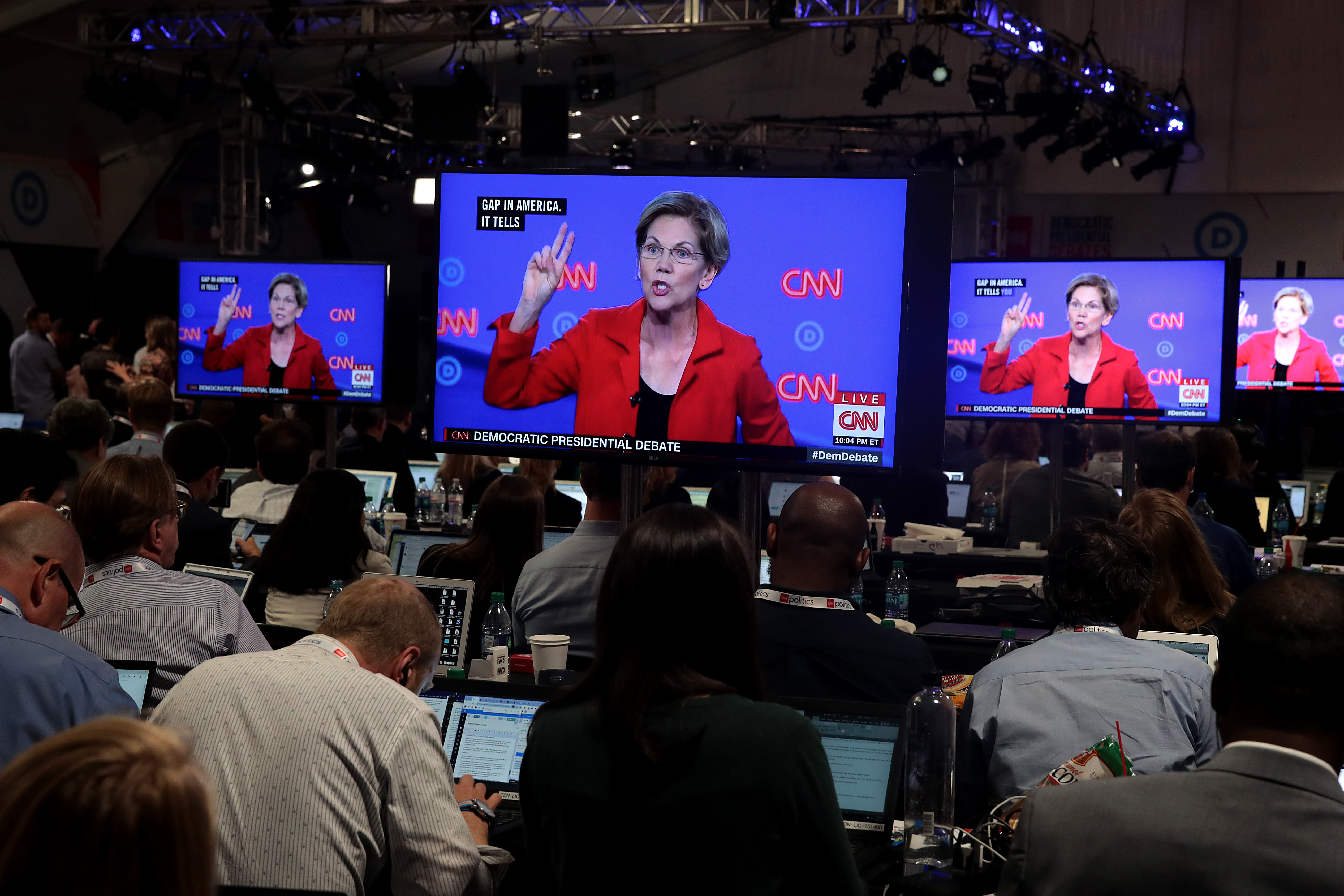 DETROIT, MICHIGAN - JULY 30: Democratic presidential candidate Sen. Elizabeth Warren (D-MA) is shown on television monitors in the press room of the Democratic Presidential Debate at the Fox Theatre July 30, 2019 in Detroit, Michigan. 20 Democratic presidential candidates were split into two groups of 10 to take part in the debate sponsored by CNN held over two nights at Detroit’s Fox Theatre. (Photo by Scott Olson/Getty Images)