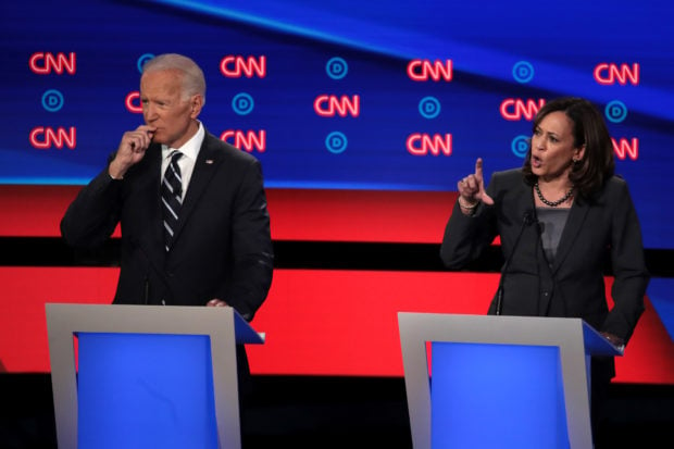 DETROIT, MICHIGAN - JULY 31: Democratic presidential candidate Sen. Kamala Harris (D-CA) (R) speaks while former Vice President Joe Biden listens during the Democratic Presidential Debate at the Fox Theatre July 31, 2019 in Detroit, Michigan. 20 Democratic presidential candidates were split into two groups of 10 to take part in the debate sponsored by CNN held over two nights at Detroit’s Fox Theatre. (Photo by Scott Olson/Getty Images)