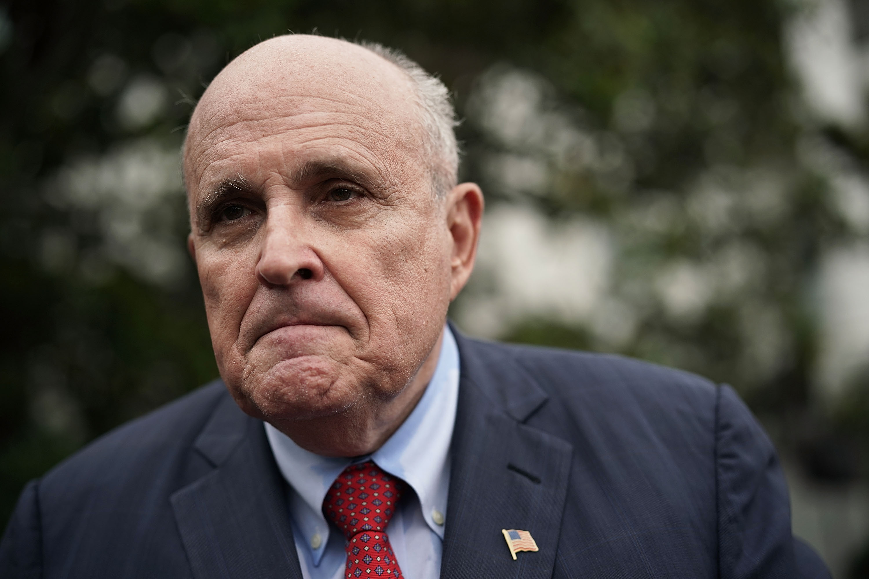 Rudy Giuliani, former New York City mayor and current lawyer for U.S. President Donald Trump, speaks to members of the media during a White House Sports and Fitness Day at the South Lawn of the White House May 30, 2018 in Washington, DC. (Photo by Alex Wong/Getty Images)