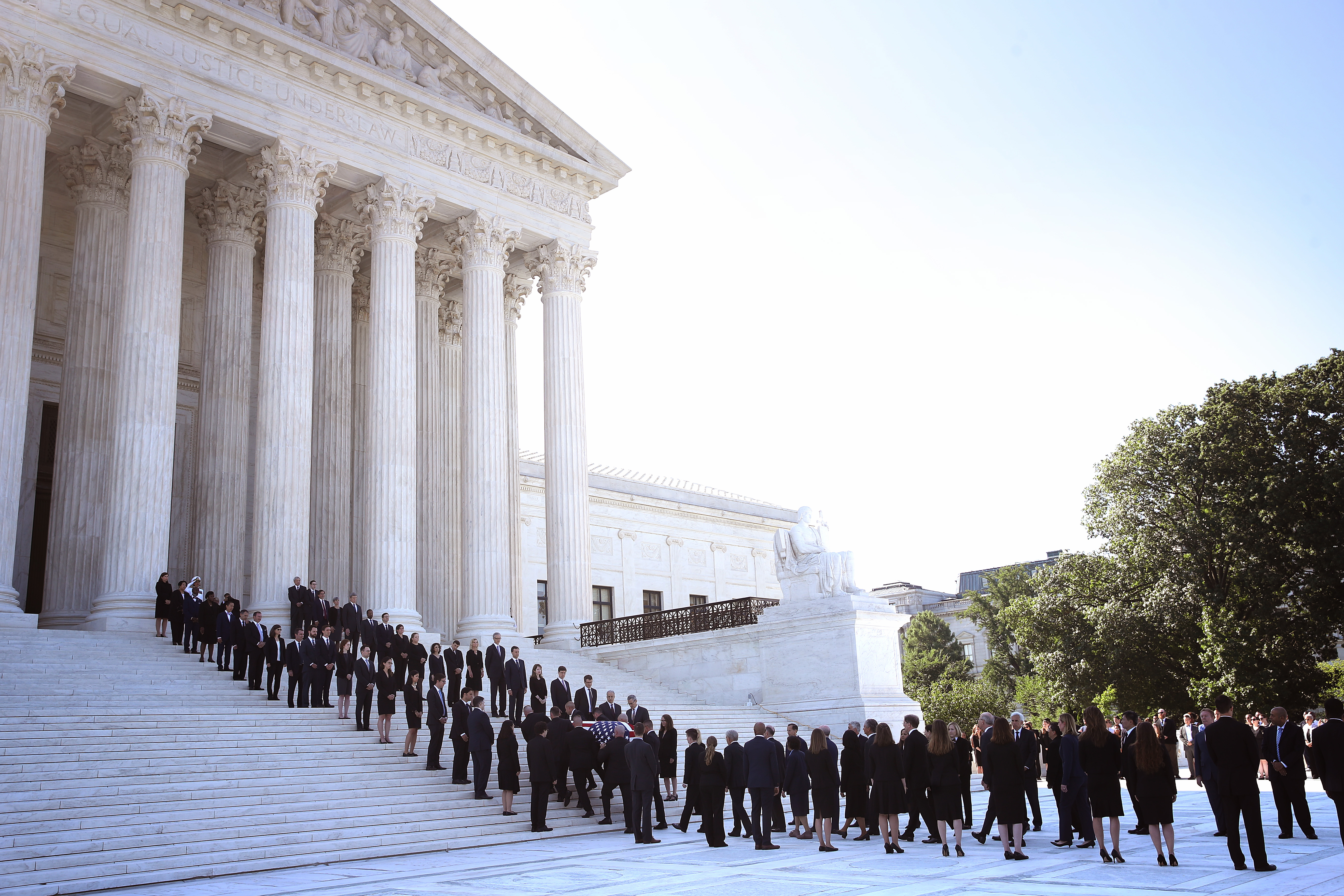 Pallbearers carry the casket of the late Justice John Paul Stevens up the steps of the Supreme Court. (Win McNamee/Getty Images)