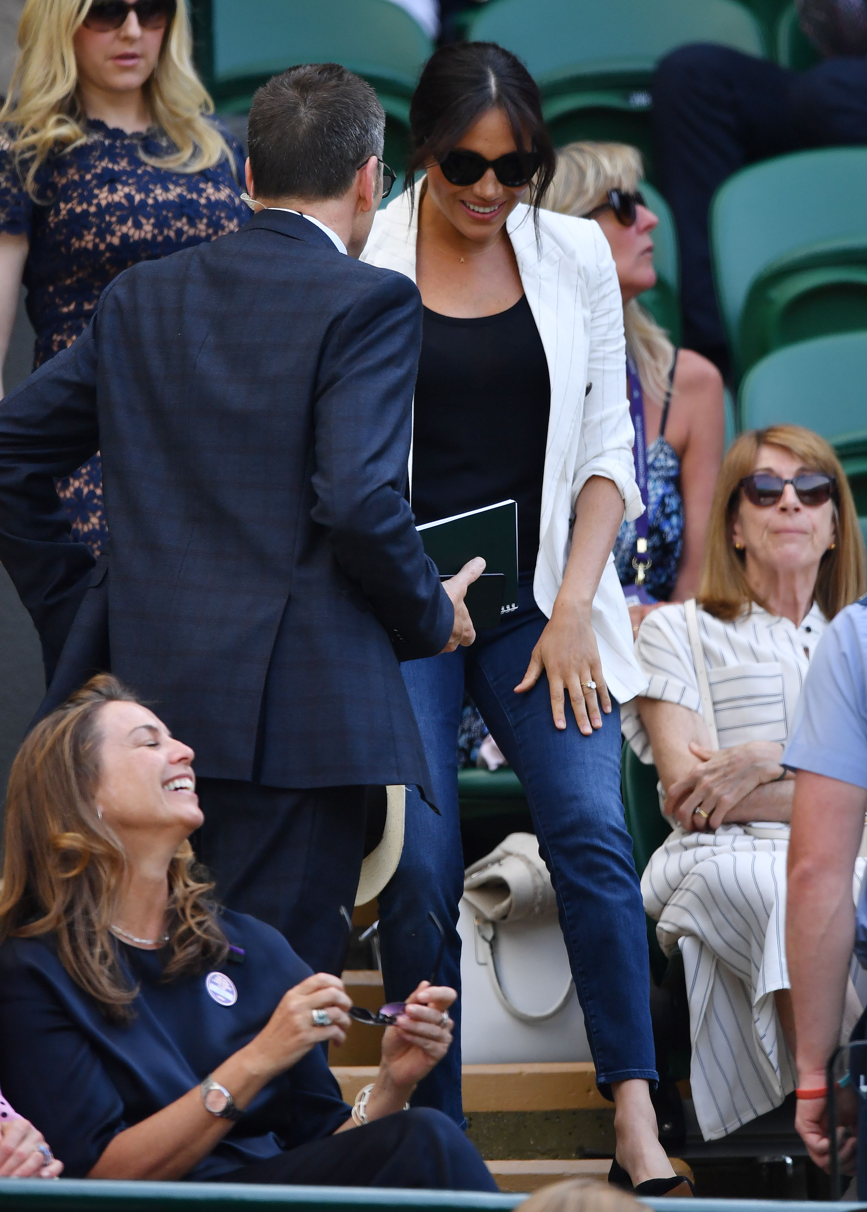 Britain's Meghan, Duchess of Sussex arrives to watch US player Serena Williams playing against Slovakia's Kaja Juvan during their women's singles second round match on the fourth day of the 2019 Wimbledon Championships at The All England Lawn Tennis Club in Wimbledon, southwest London, on July 4, 2019. (Photo credit GLYN KIRK/AFP/Getty Images)