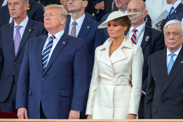 US President Donald Trump (L), US First Lady Melania Trump (C) and Greek President Prokopis Pavlopoulos attend an event to commemorate the 75th anniversary of the D-Day landings, in Portsmouth, southern England, on June 5, 2019.(Photo credit: CHRIS JACKSON/AFP/Getty Images)