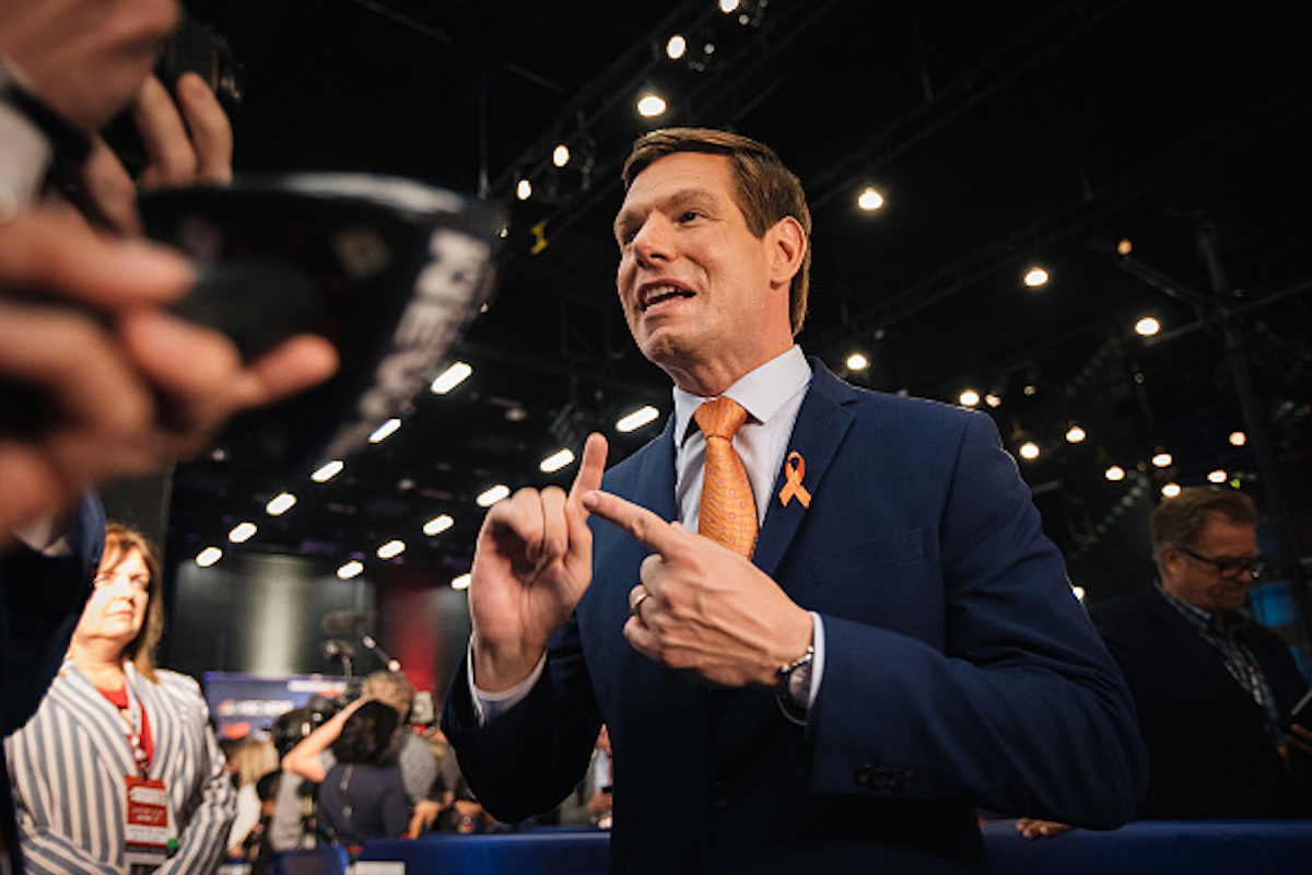 Representative Eric Swalwell, a Democrat from California and 2020 presidential candidate, speaks to the media following the Democratic presidential candidate debate in Miami, Florida, U.S., on Thursday, June 27, 2019. The candidates running for the Democratic presidential nomination rallied around the idea of a government-run Medicare option Thursday night, disagreeing only over whether to make it an option or put all Americans in the program. Photographer: Jayme Gershen/Bloomberg via Getty Images