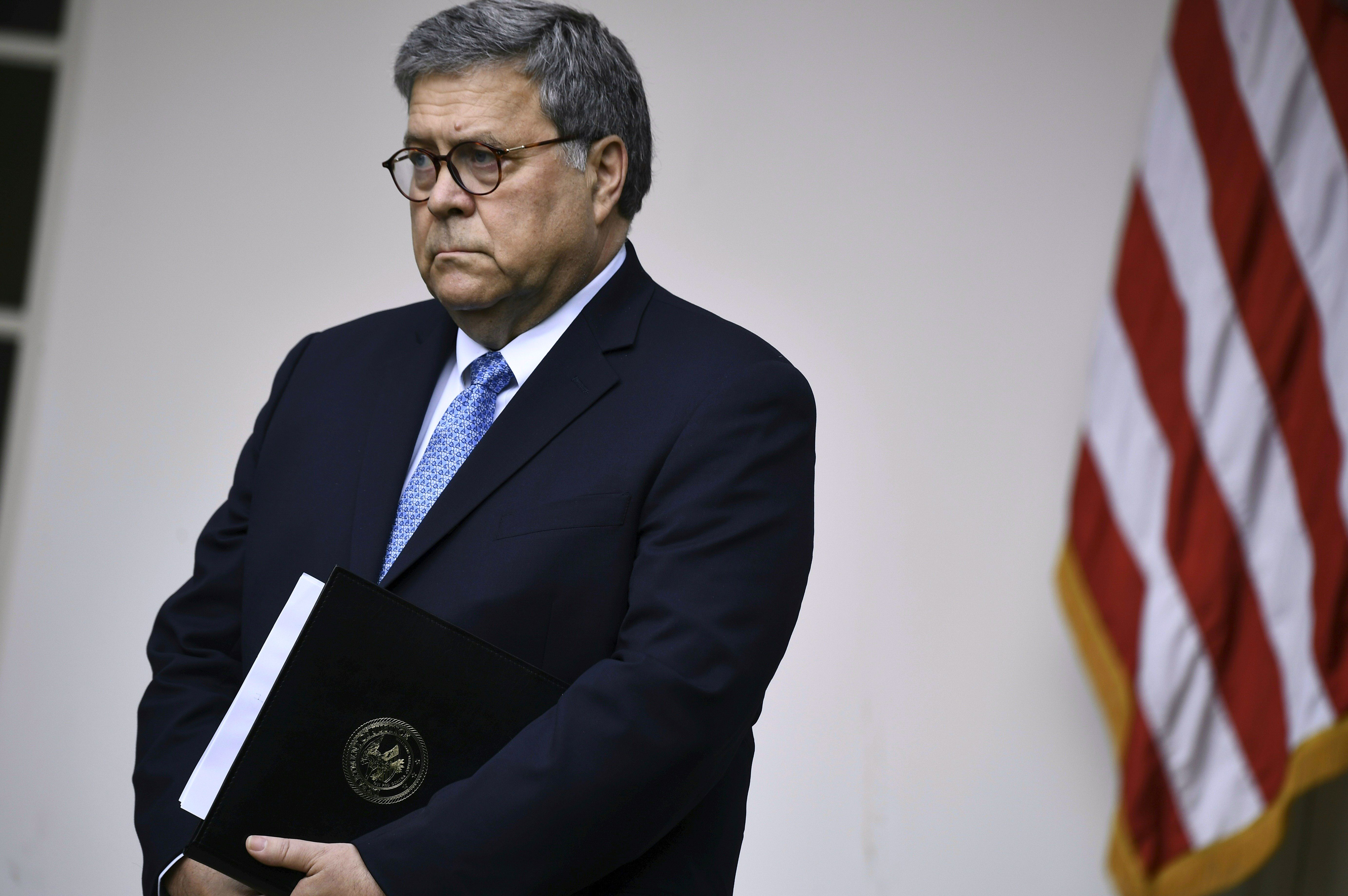 Attorney General William Barr looks on as the president delivers remarks on citizenship and the census on July 11, 2019. (Brendan Smialowski/AFP/Getty Images)