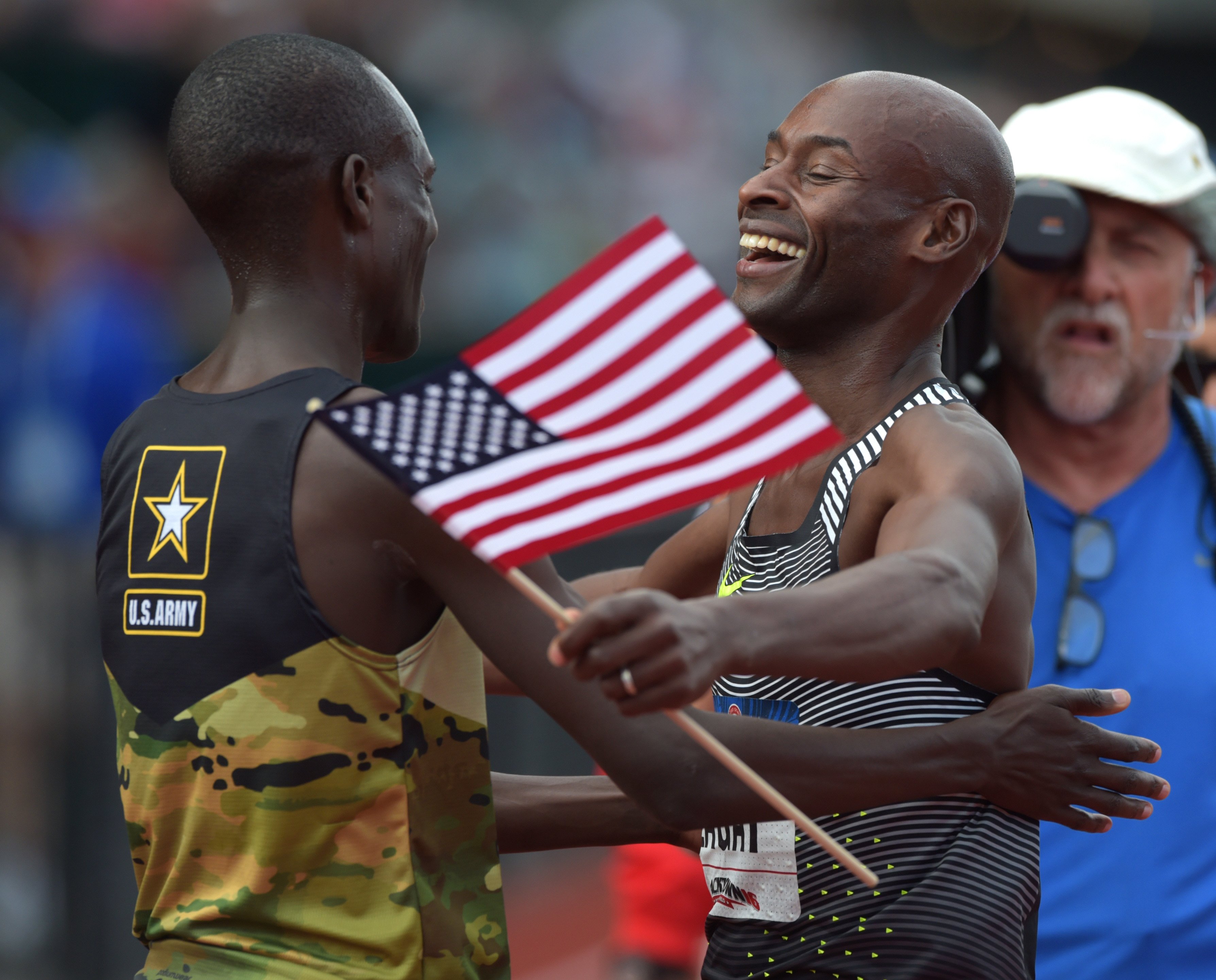 Jul 9, 2016; Eugene, OR, USA; Bernard Lagat (right) reacts with Shadrack Kipchirchir (left) after winning the men's 5000m final during the 2016 U.S. Olympic track and field team trials at Hayward Field. Mandatory Credit: Glenn Andrews-USA TODAY Sports