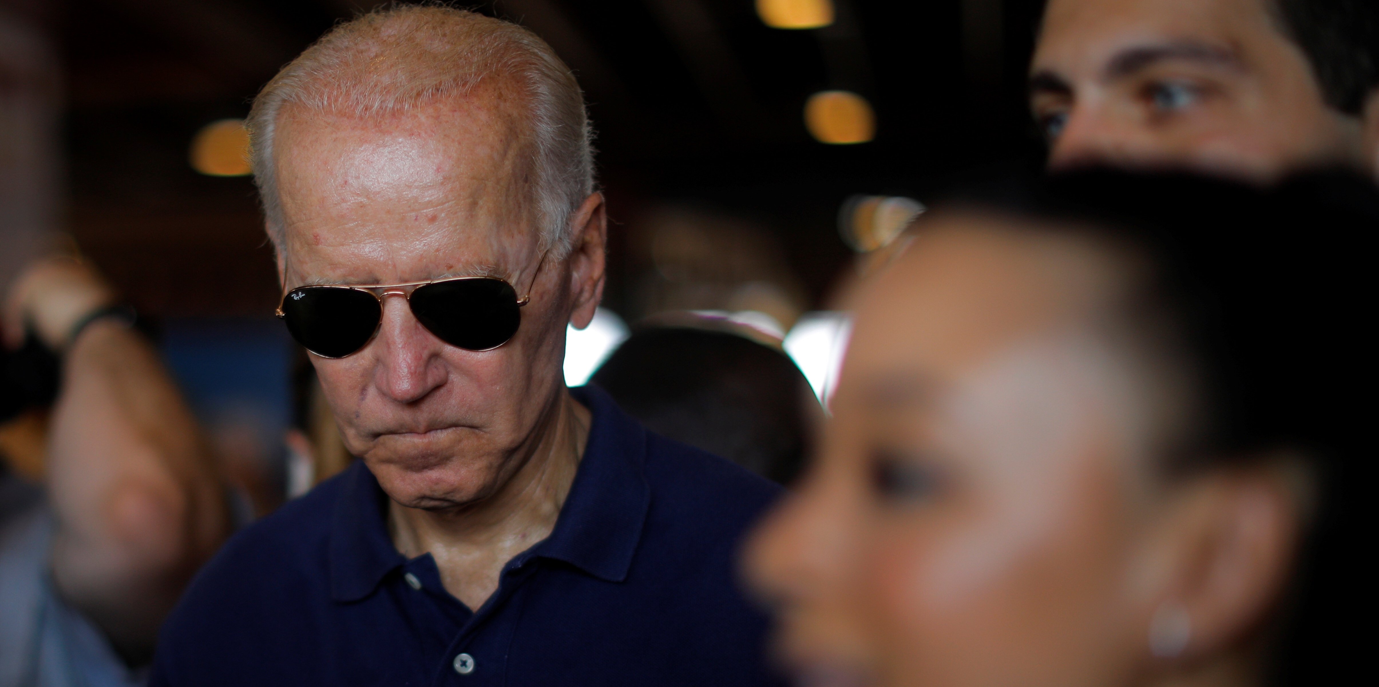 Democratic 2020 U.S. presidential candidate and former U.S. Vice President Joe Biden pauses while signing autographs at the Iowa State Fair in Des Moines, Iowa, U.S., August 8, 2019. REUTERS/Brian Snyder