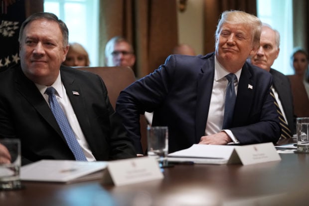 WASHINGTON, DC - JULY 16: U.S. President Donald Trump listens to a presentation about prescription drugs during a cabinet meeting with Secretary of State Mike Pompeo (L), acting Defense Secretary Richard Spencer and others at the White House July 16, 2019 in Washington, DC. Trump and members of his administration addressed a wide variety of subjects, including Iran, opportunity zones, drug prices, HIV/AIDS, immigration and other subjects for more than an hour. (Photo by Chip Somodevilla/Getty Images)