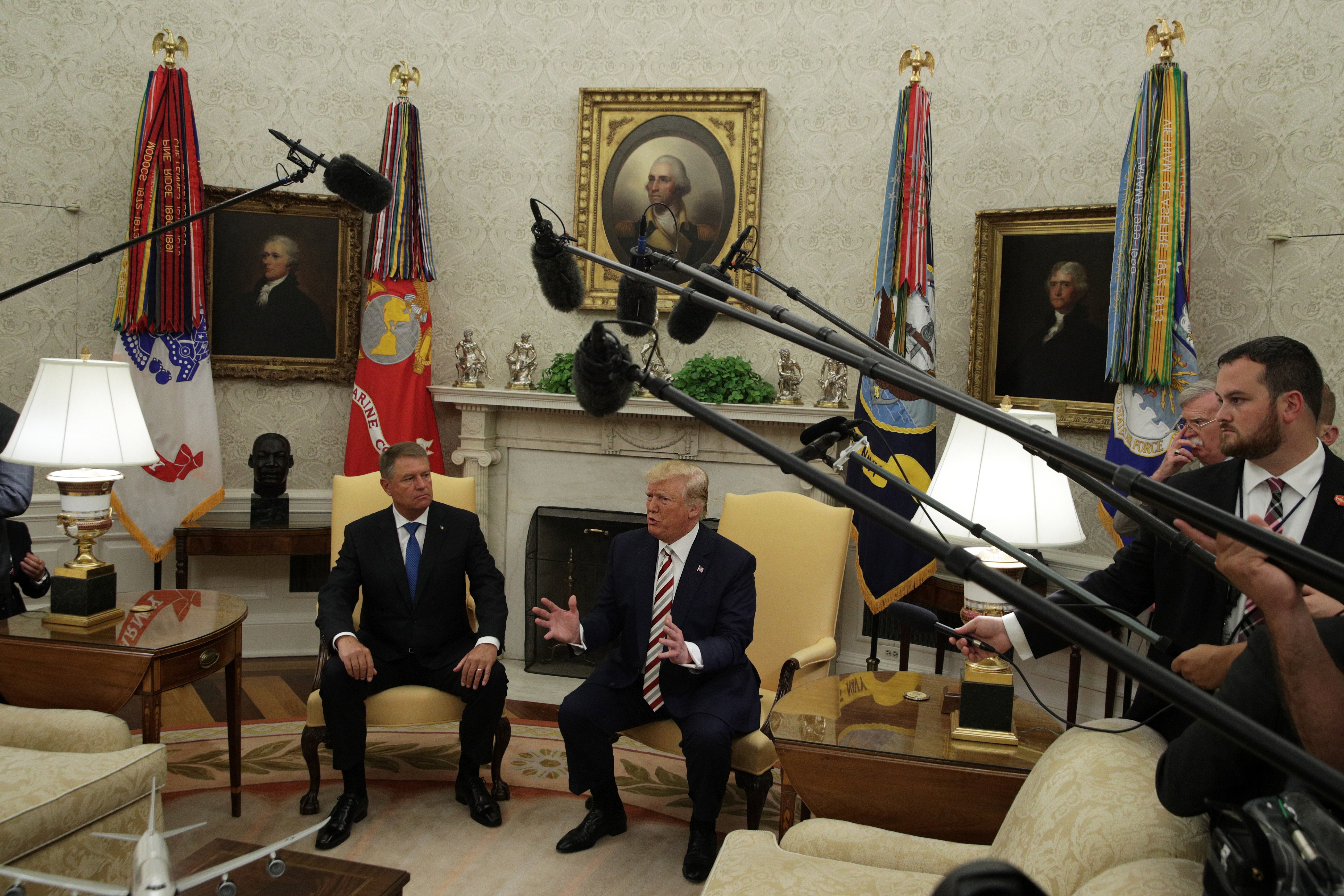 WASHINGTON, DC - AUGUST 20: U.S. President Donald Trump speaks to members of the media as President of Romania Klaus Iohannis listens in the Oval Office of the White House August 20, 2019 in Washington, DC. This is Iohannis’ second visit to the Trump White House and the two leaders are expected to discuss bilateral issues during their meeting. (Photo by Alex Wong/Getty Images)