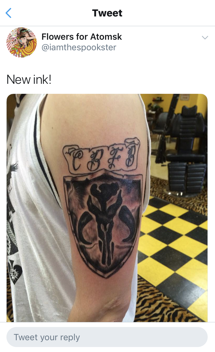 An image tweeted out by the now-deleted account appears to match part of a tattoo showing in a photo circulated by media. (Screenshot Twitter, @iamthespookster)