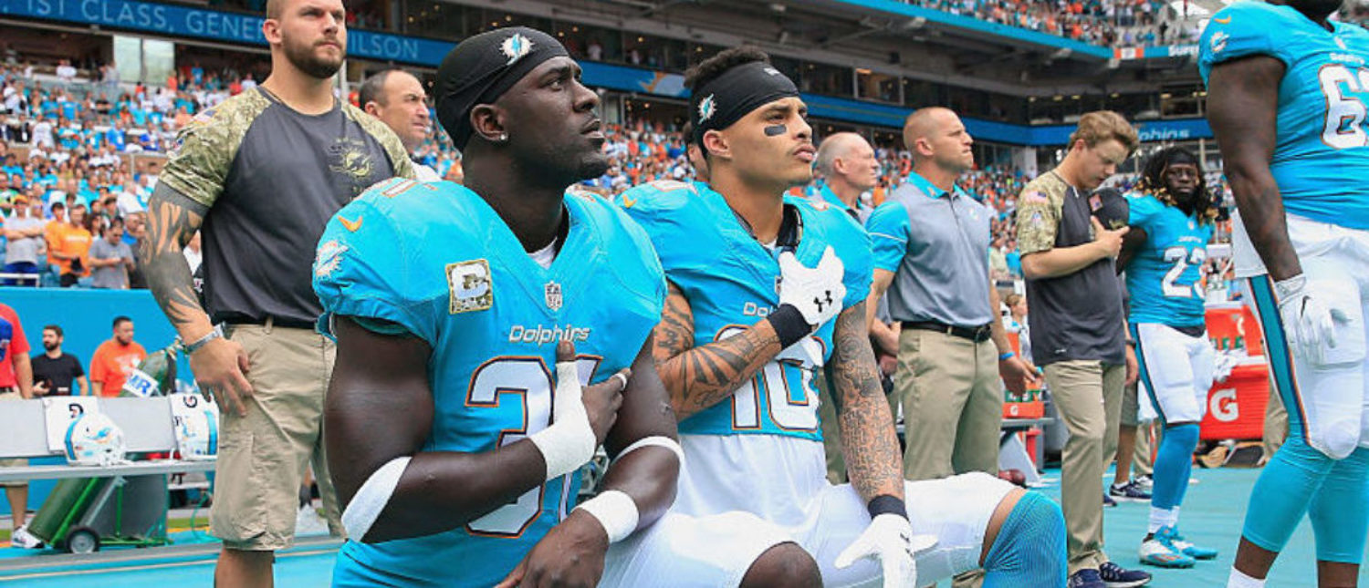 MIAMI GARDENS, FL - NOVEMBER 06: Michael Thomas #31 of the Miami Dolphins and Kenny Stills #10 of the Miami Dolphins take a knee during the national anthem prior to the game against the New York Jets at the Hard Rock Stadium on November 6, 2016 in Miami Gardens, Florida. (Photo by Chris Trotman/Getty Images)