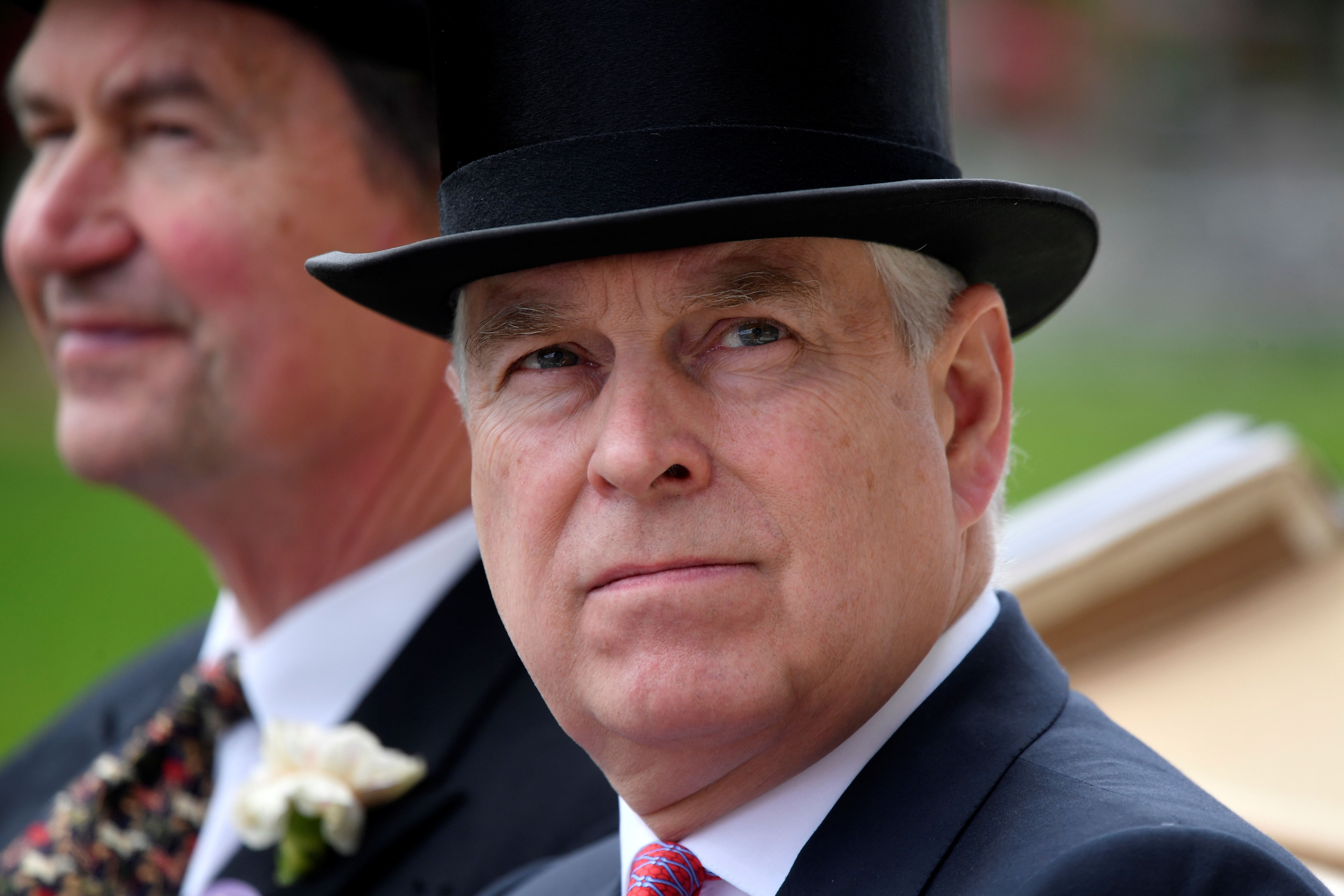 Britain's Prince Andrew arrives by horse and carriage on ladies day REUTERS/Toby Melville 